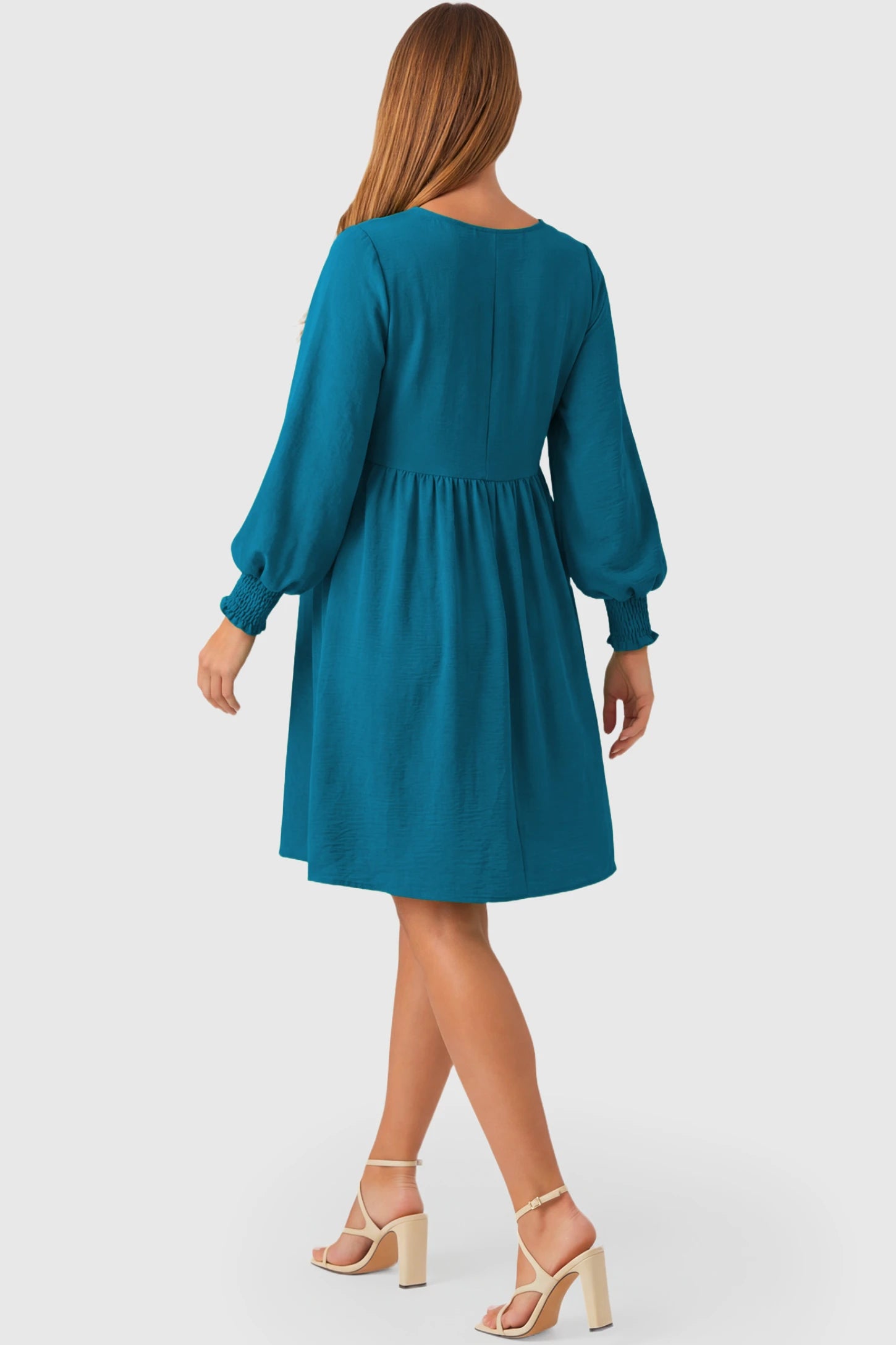Balloon Sleeve Empire Waist Maternity Midi Dress Balloon Sleeve Empire Waist Maternity Midi Dress in peacock blue featuring smocked elastic cuff sleeves and soft drape on a pregnant model.