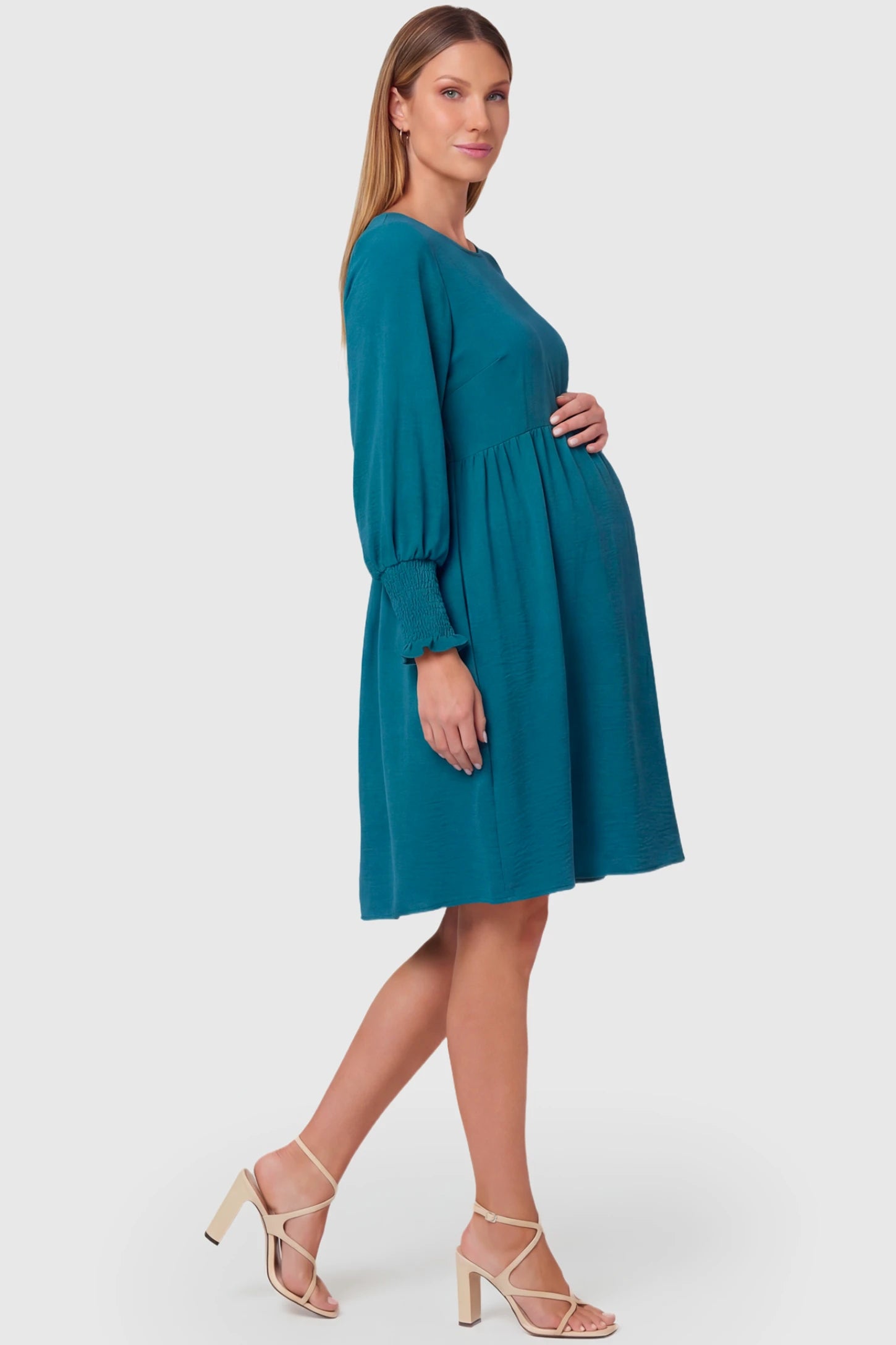 Balloon Sleeve Empire Waist Maternity Midi Dress Balloon Sleeve Empire Waist Maternity Midi Dress in peacock blue featuring smocked elastic cuff sleeves and soft drape on a pregnant model.