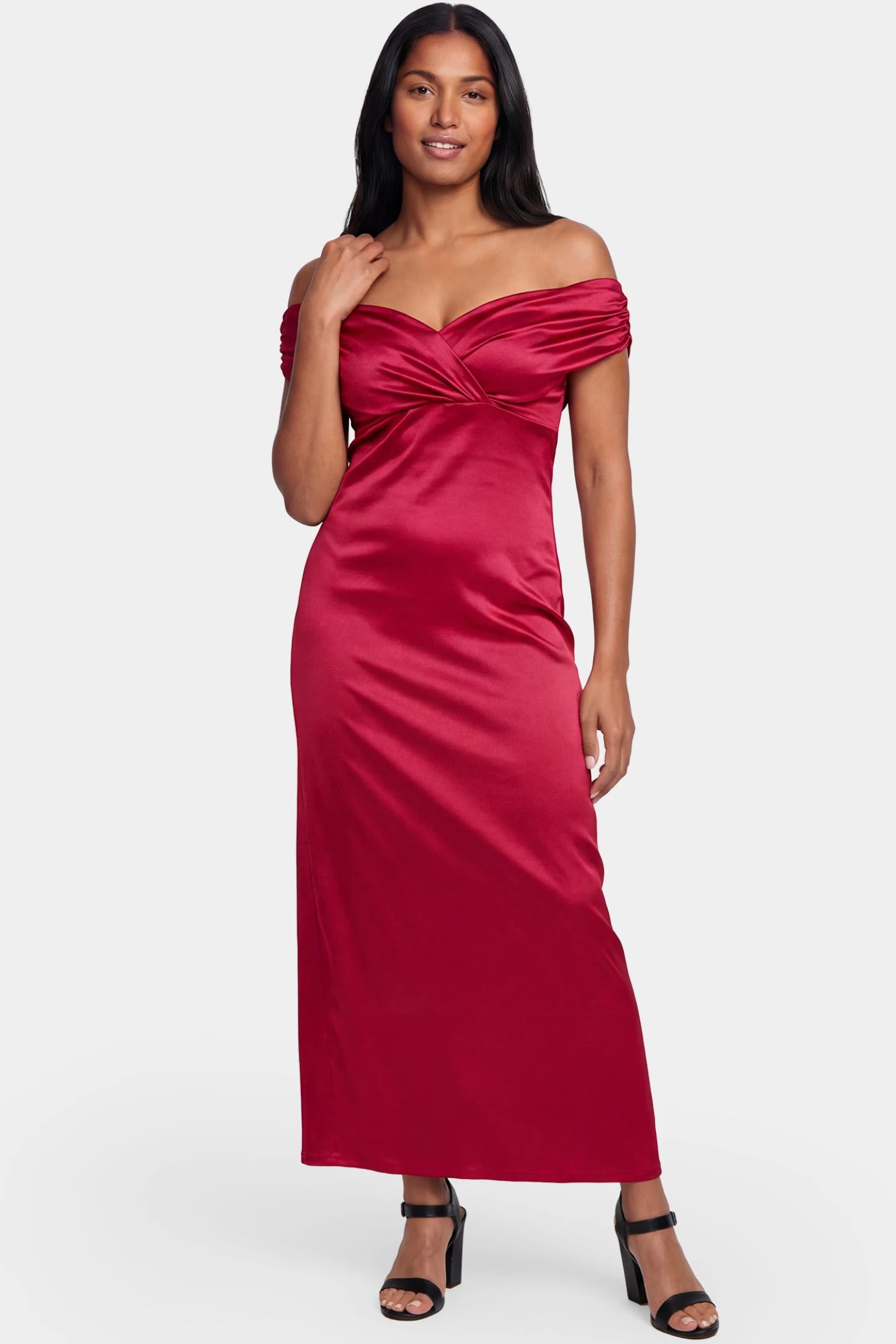 Off-Shoulder Fitted Waist Flowing Maxi Maternity Dress Off-shoulder fitted waist flowing maxi maternity dress in red featuring off-shoulder neckline in front view on a postpartum model