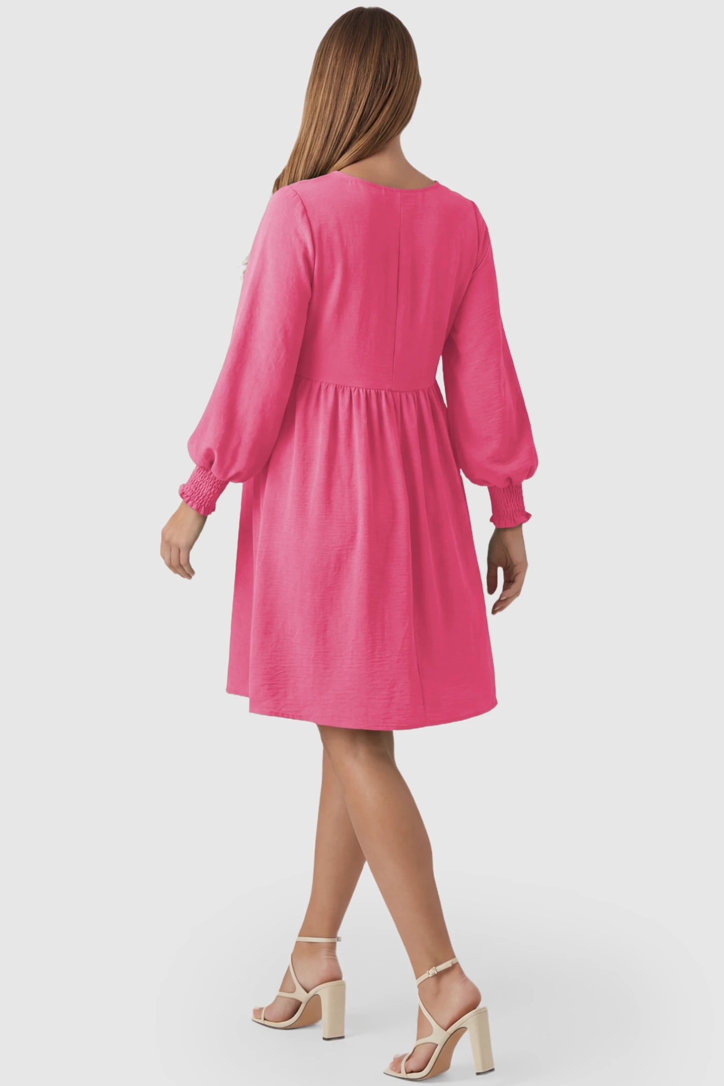 Balloon Sleeve Empire Waist Maternity Midi Dress Balloon Sleeve Empire Waist Maternity Midi Dress in rose red featuring smocked elastic cuff sleeves and soft drape on a pregnant model, back view.