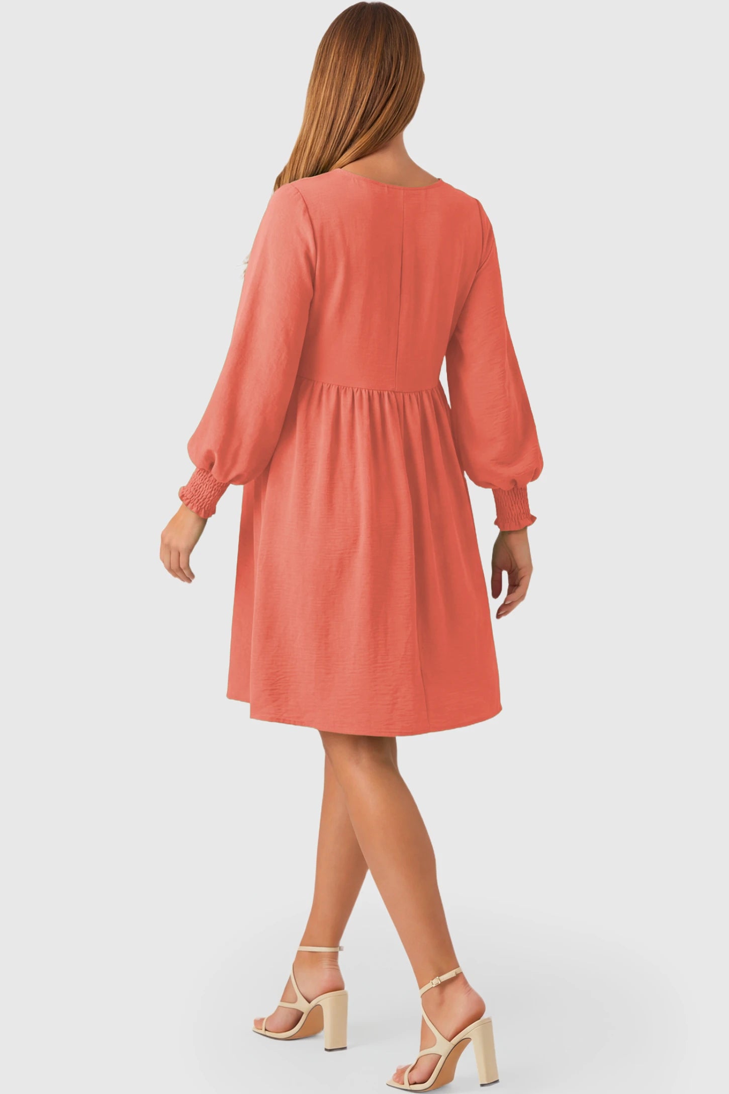 Balloon Sleeve Empire Waist Maternity Midi Dress Balloon Sleeve Empire Waist Maternity Midi Dress in watermelon red featuring smocked elastic cuff sleeves and soft drape on a pregnant model.