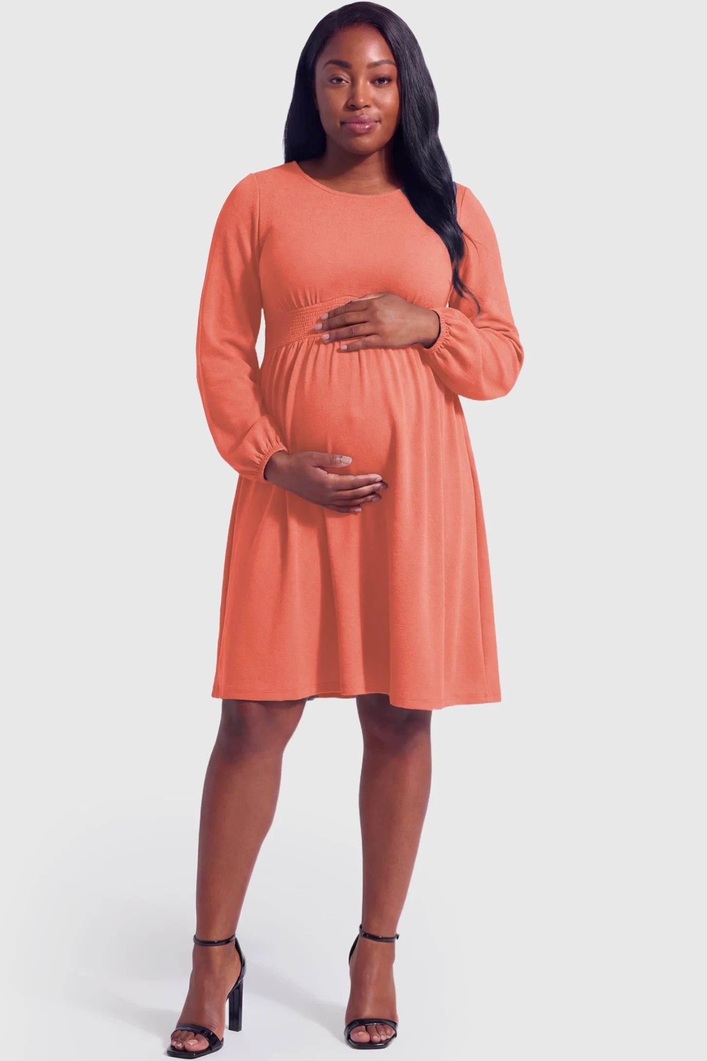 Balloon Sleeve Empire Waist Maternity Midi Dress Balloon Sleeve Empire Waist Maternity Midi Dress in watermelon red featuring smocked elastic cuff sleeves and soft drape on a plus size pregnant model.