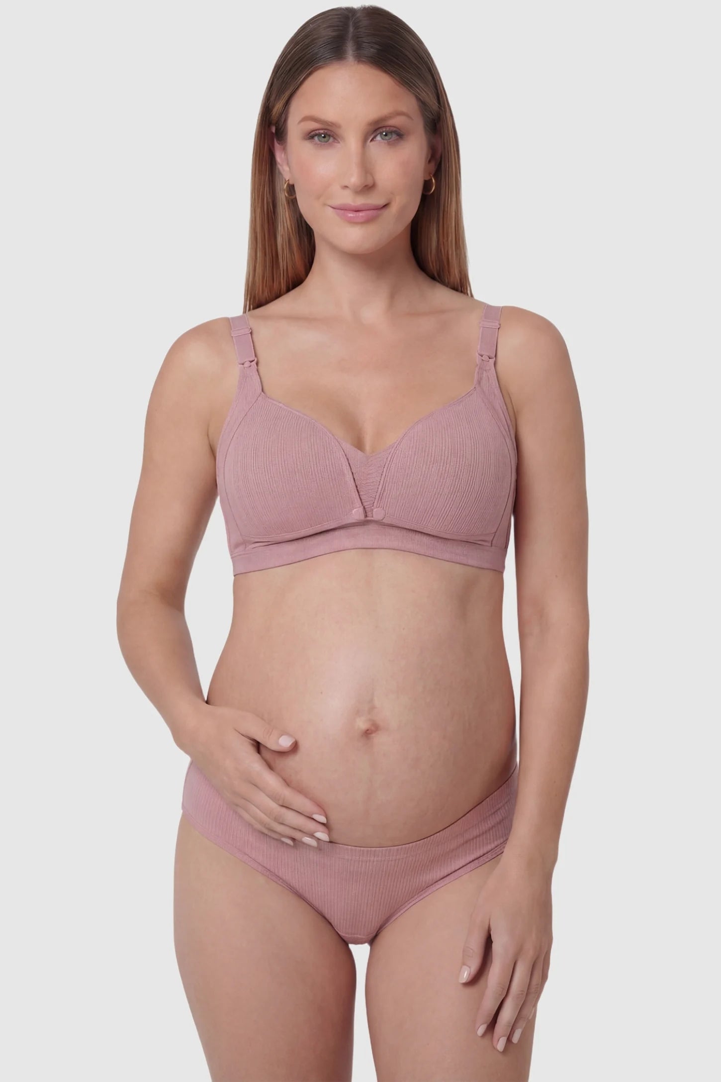Front-Open Snap Wire-Free Maternity Nursing Bra Front-Open Buckle Wire-Free Maternity Nursing Bra in Dusty Rose featuring one-second release snaps on a front view of a pregnant model.