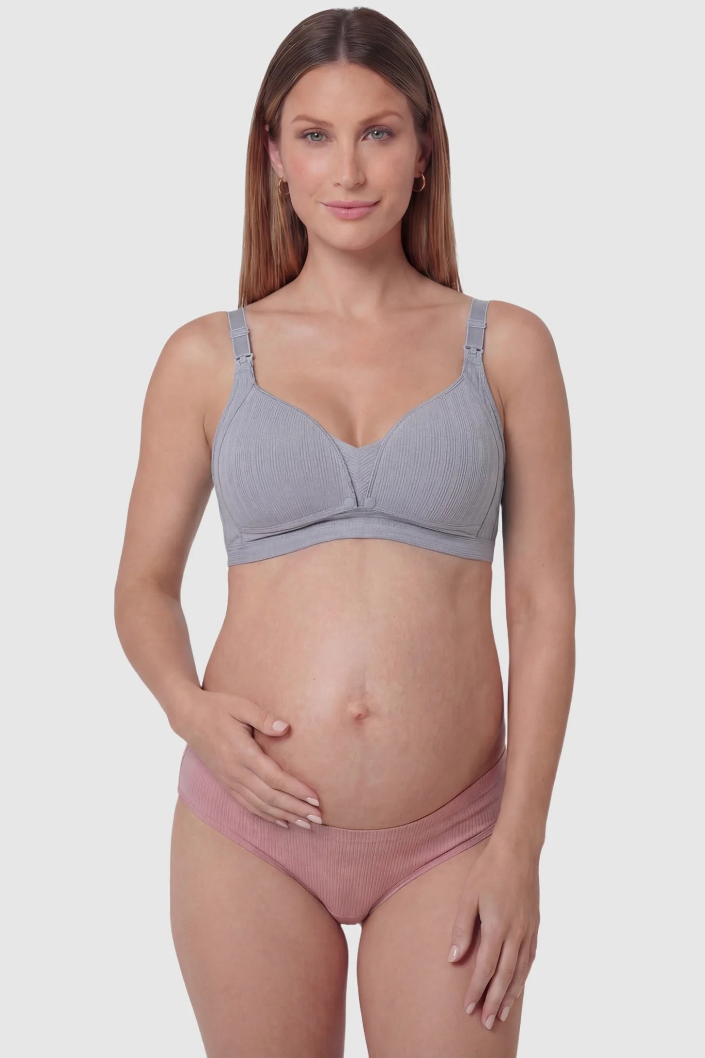 Front-Open Snap Wire-Free Maternity Nursing Bra Front-Open Buckle Wire-Free Maternity Nursing Bra in Gray featuring one-second release snaps on a front view of a pregnant model.