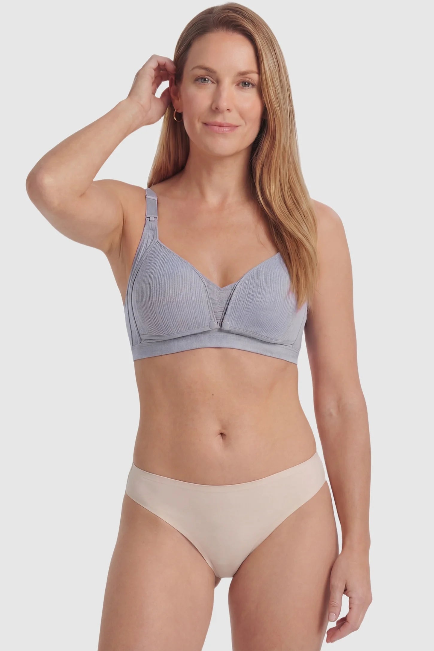 Front-Open Snap Wire-Free Maternity Nursing Bra Front-Open Snap Wire-Free Maternity Nursing Bra in Gray featuring adjustable straps and front-open snaps on a postpartum model, front view.