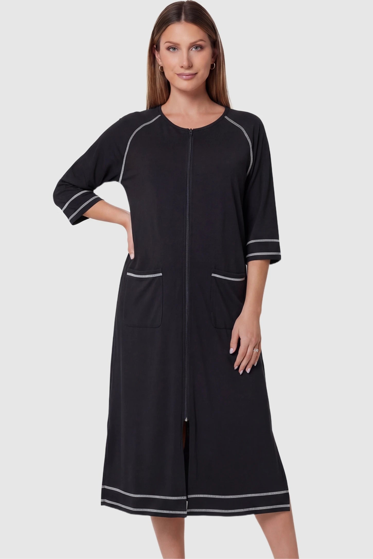 Front Zipper Three-Quarter Sleeve Midi Maternity & Nursing Dress Front zipper three-quarter sleeve midi maternity and nursing dress in black featuring convenient nursing zipper access in front view on a pregnant model