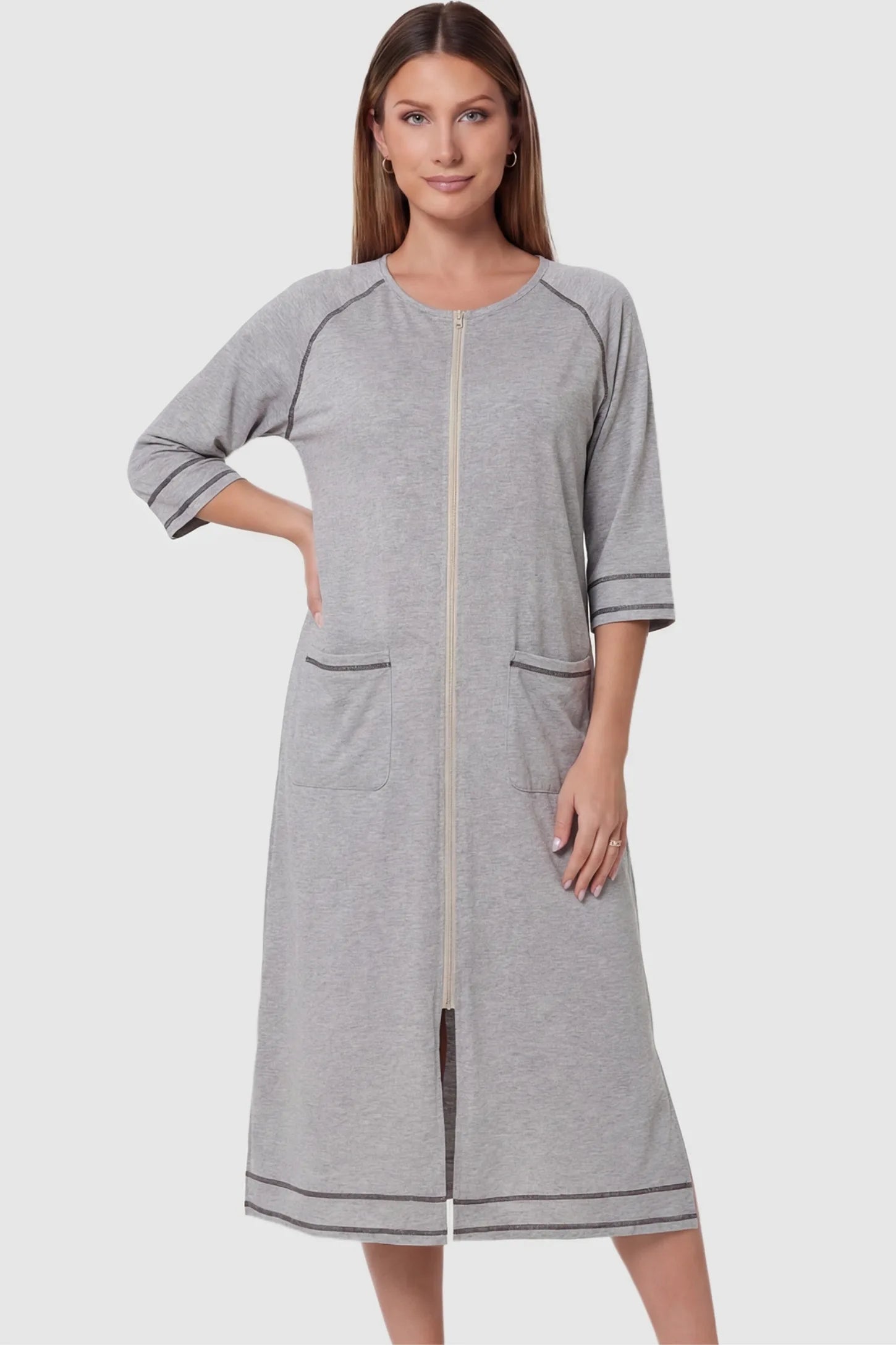 Front Zipper Three-Quarter Sleeve Midi Maternity & Nursing Dress Front zipper three-quarter sleeve midi maternity and nursing dress in light gray featuring convenient nursing zipper access in front view on a pregnant model