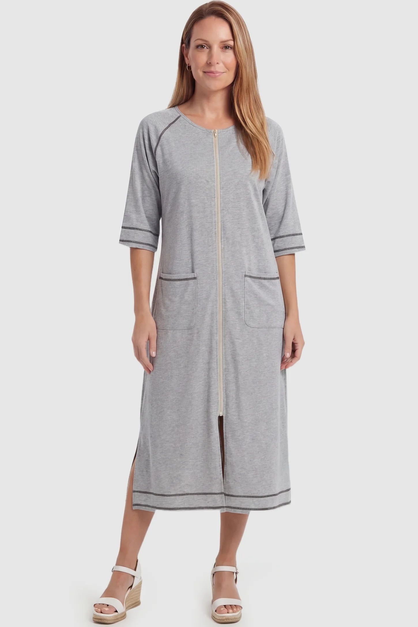 Front Zipper Three-Quarter Sleeve Midi Maternity & Nursing Dress Front zipper three-quarter sleeve midi maternity and nursing dress in light gray featuring front zipper and pockets in full body view on a postpartum model