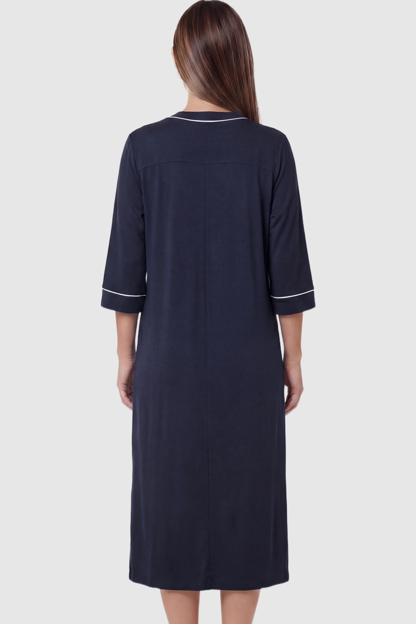 Front Zipper Three-Quarter Sleeve Midi Maternity & Nursing Dress Front zipper three-quarter sleeve midi maternity and nursing dress in navy blue featuring comfortable loose fit in back view on a pregnant model