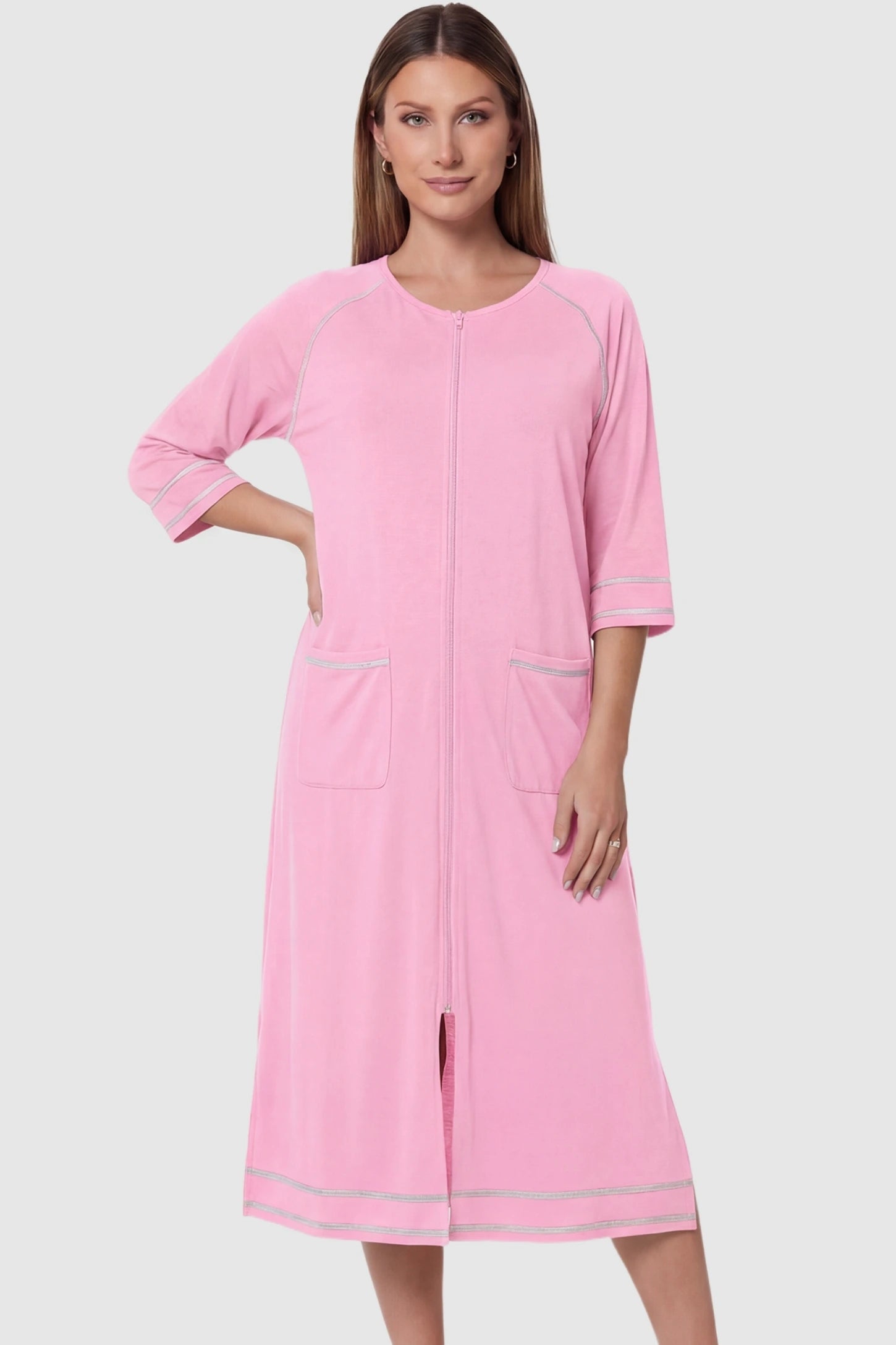 Front Zipper Three-Quarter Sleeve Midi Maternity & Nursing Dress Front zipper three-quarter sleeve midi maternity and nursing dress in pink featuring convenient nursing zipper access in front view on a pregnant model