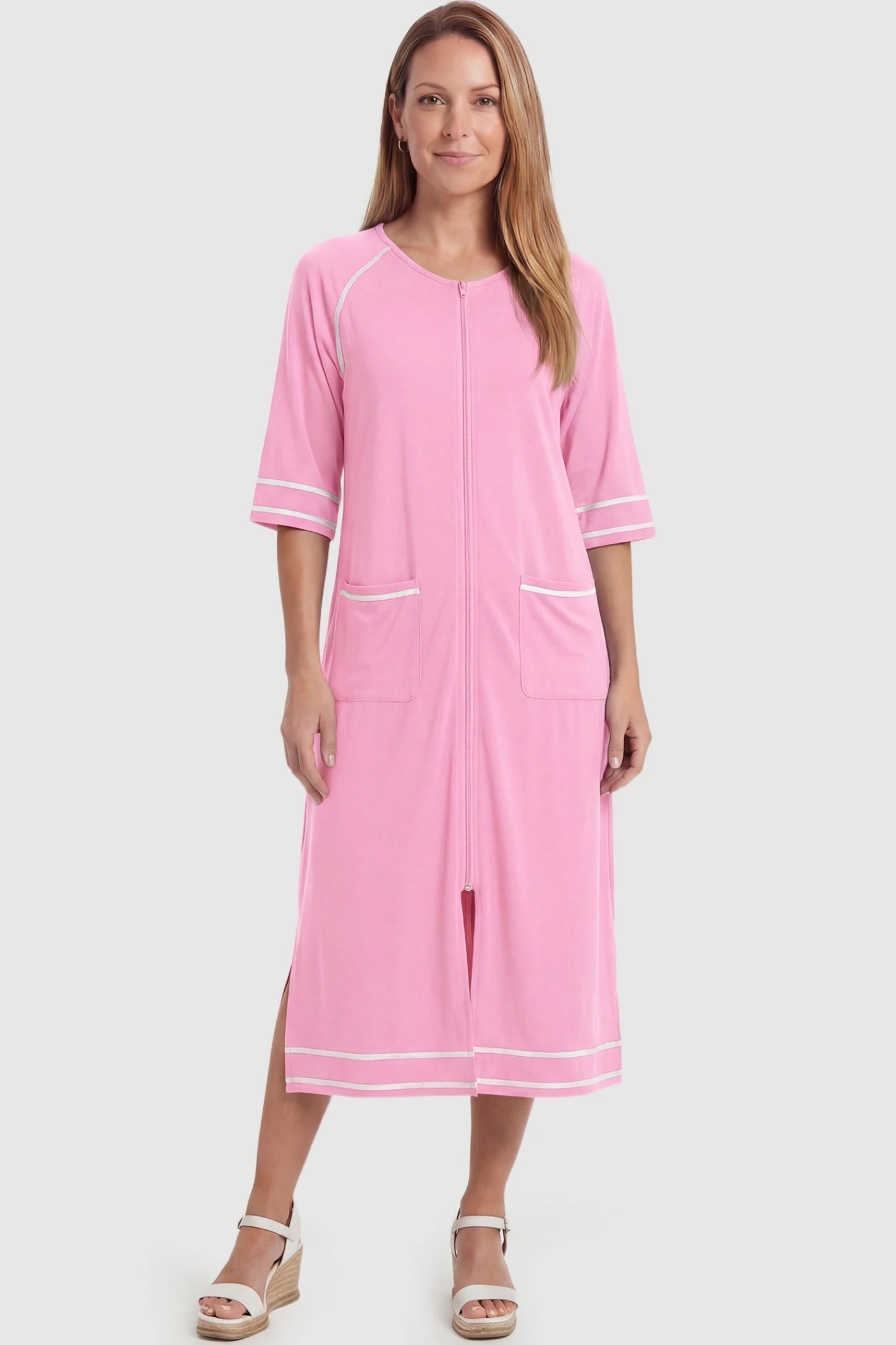 Front Zipper Three-Quarter Sleeve Midi Maternity & Nursing Dress Front zipper three-quarter sleeve midi maternity and nursing dress in pink featuring front zipper and pockets in full body view on a postpartum model