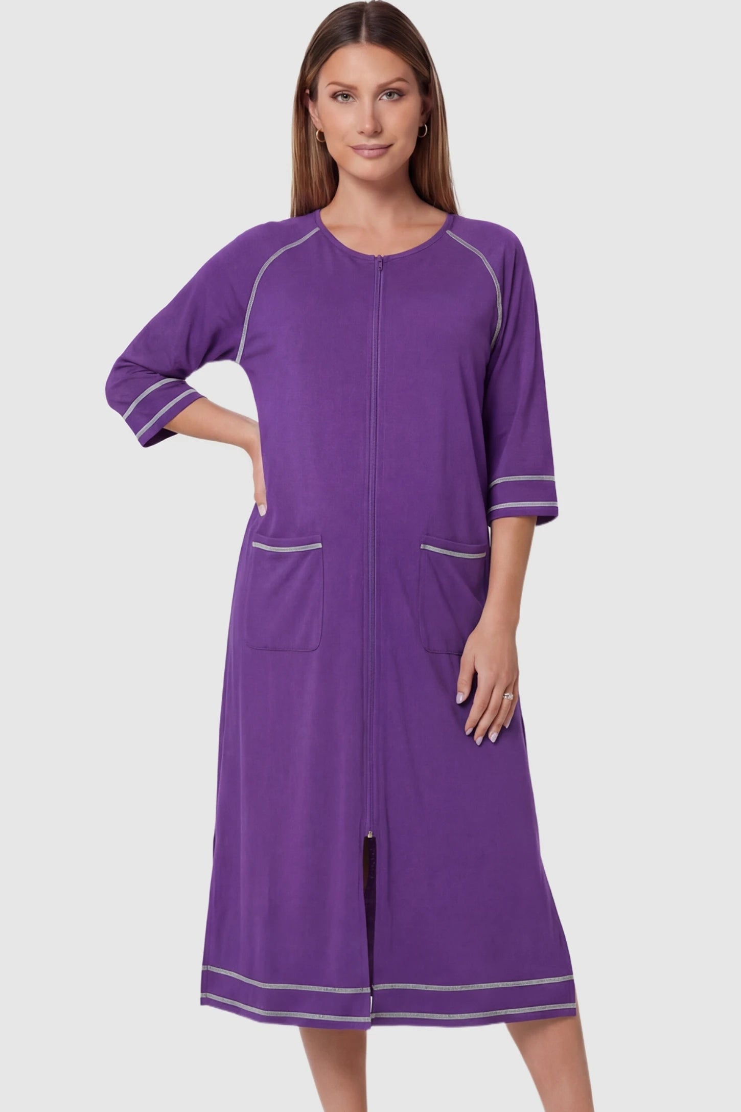 Front Zipper Three-Quarter Sleeve Midi Maternity & Nursing Dress Front zipper three-quarter sleeve midi maternity and nursing dress in purple featuring convenient nursing zipper access in front view on a pregnant model