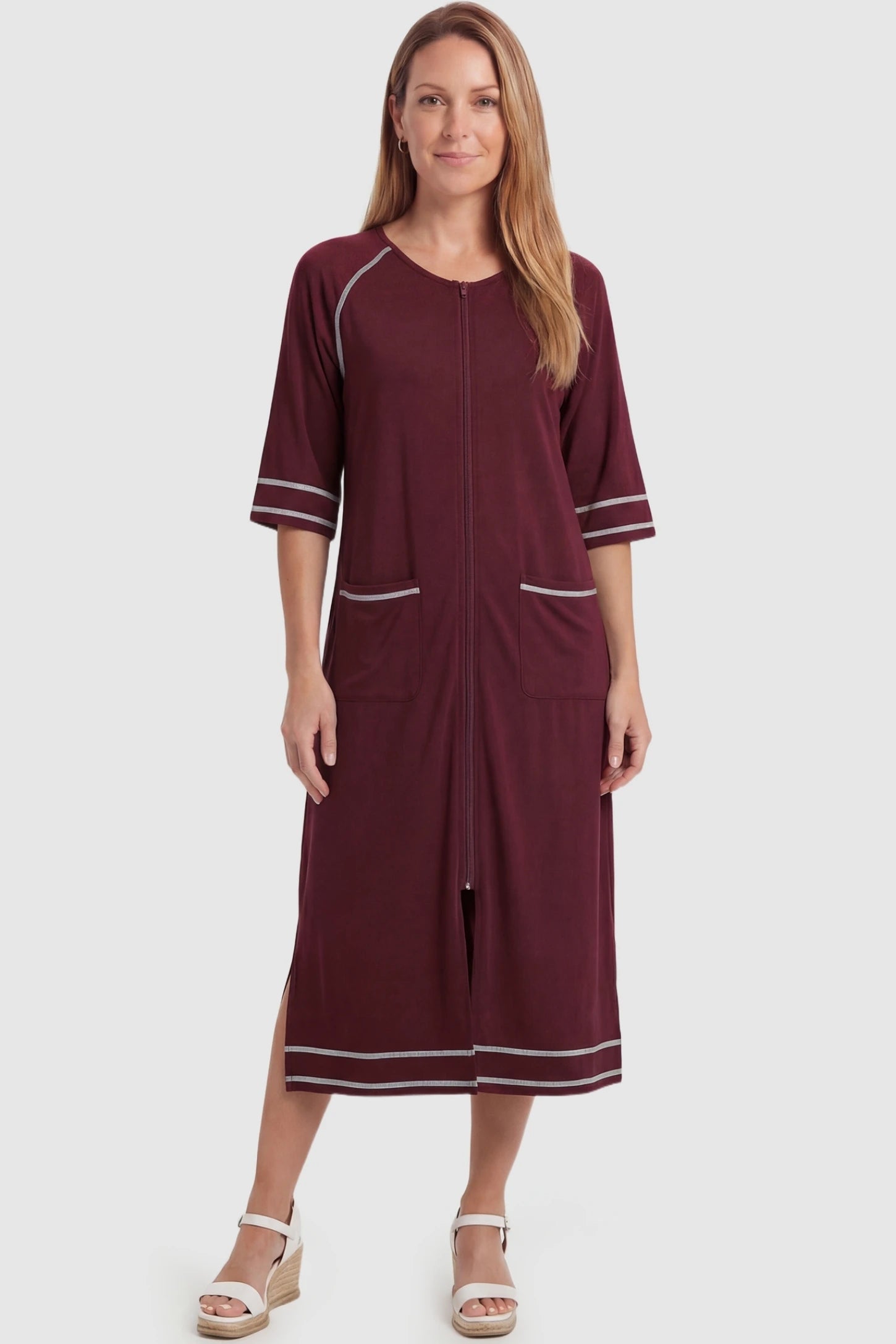 Front Zipper Three-Quarter Sleeve Midi Maternity & Nursing Dress Front zipper three-quarter sleeve midi maternity and nursing dress in wine red featuring front zipper and pockets in full body view on a postpartum model