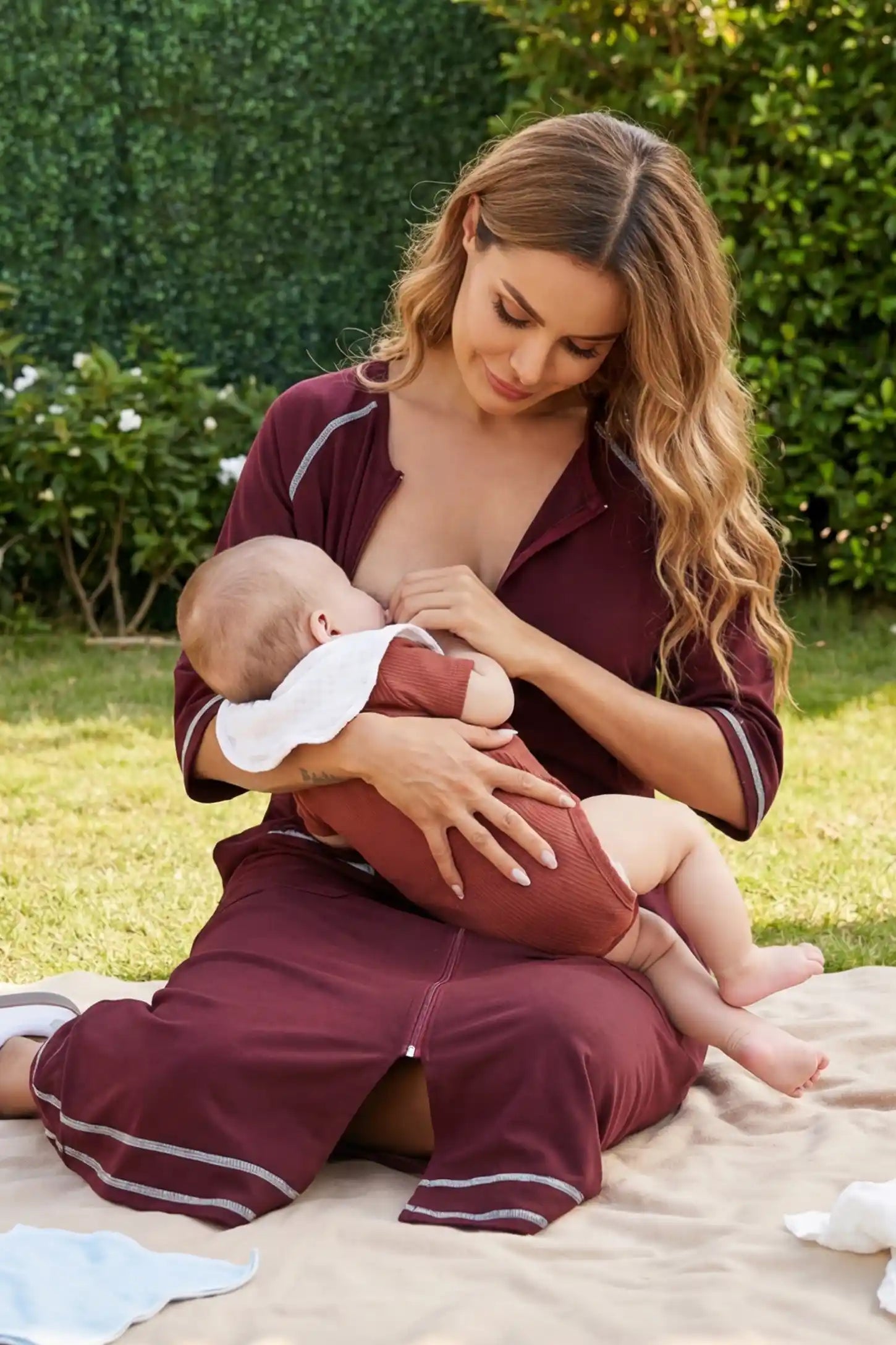 Front Zipper Three-Quarter Sleeve Midi Maternity & Nursing Dress Front zipper three-quarter sleeve midi maternity and nursing dress in wine red featuring easy nursing access in front view on a UGC model