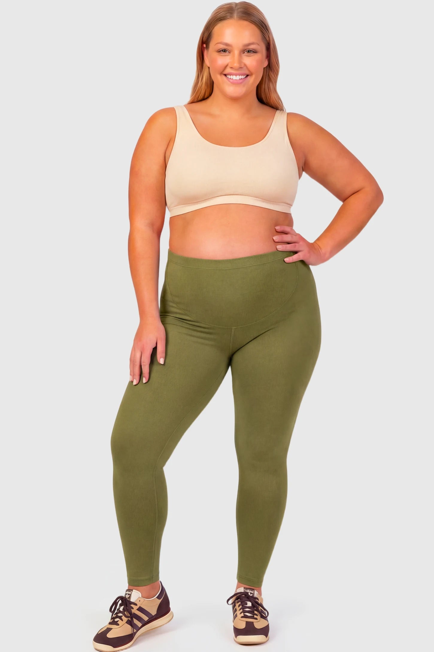 Full-Panel Ankle-Length Maternity Yoga Leggings Full-Panel Ankle-Length Maternity Yoga Leggings in army green featuring over-the-belly support and full-length fit on plus size pregnant model.