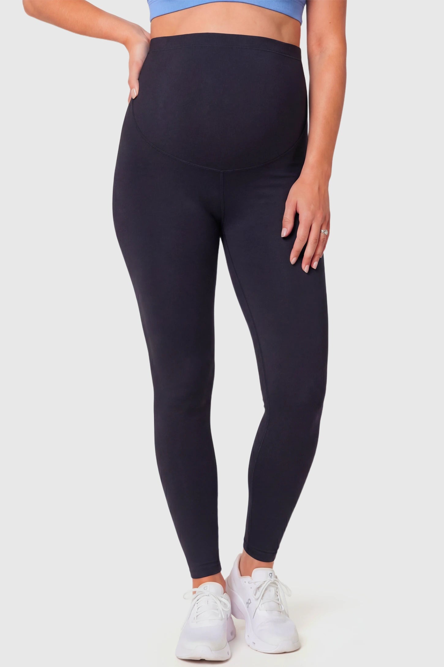 Full-Panel Ankle-Length Maternity Yoga Leggings Full-Panel Ankle-Length Maternity Yoga Leggings in black featuring over-the-belly support and full-length fit on pregnant model.