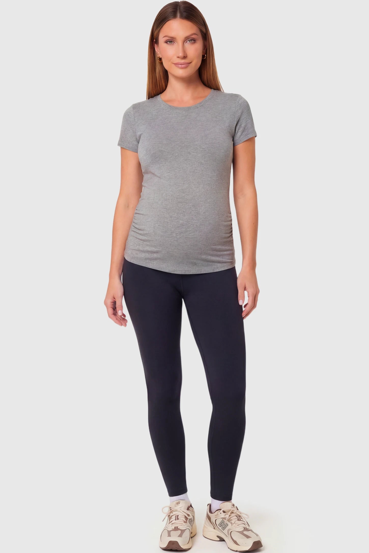 Full-Panel Ankle-Length Maternity Yoga Leggings Full-Panel Ankle-Length Maternity Yoga Leggings in black featuring over-the-belly support and full-length fit on pregnant model.