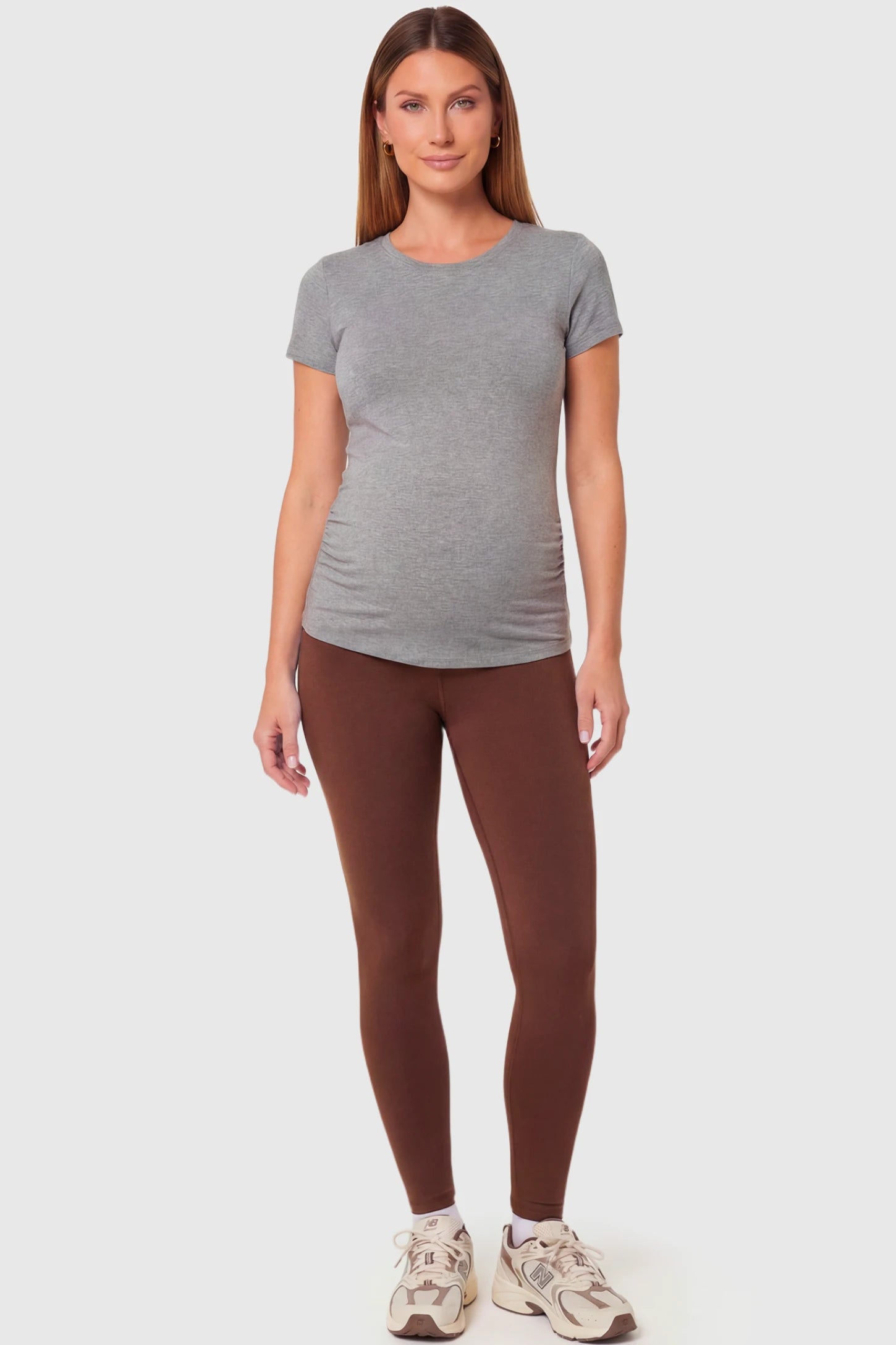Full-Panel Ankle-Length Maternity Yoga Leggings Full-Panel Ankle-Length Maternity Yoga Leggings in coffee featuring over-the-belly support and full-length fit on pregnant model.
