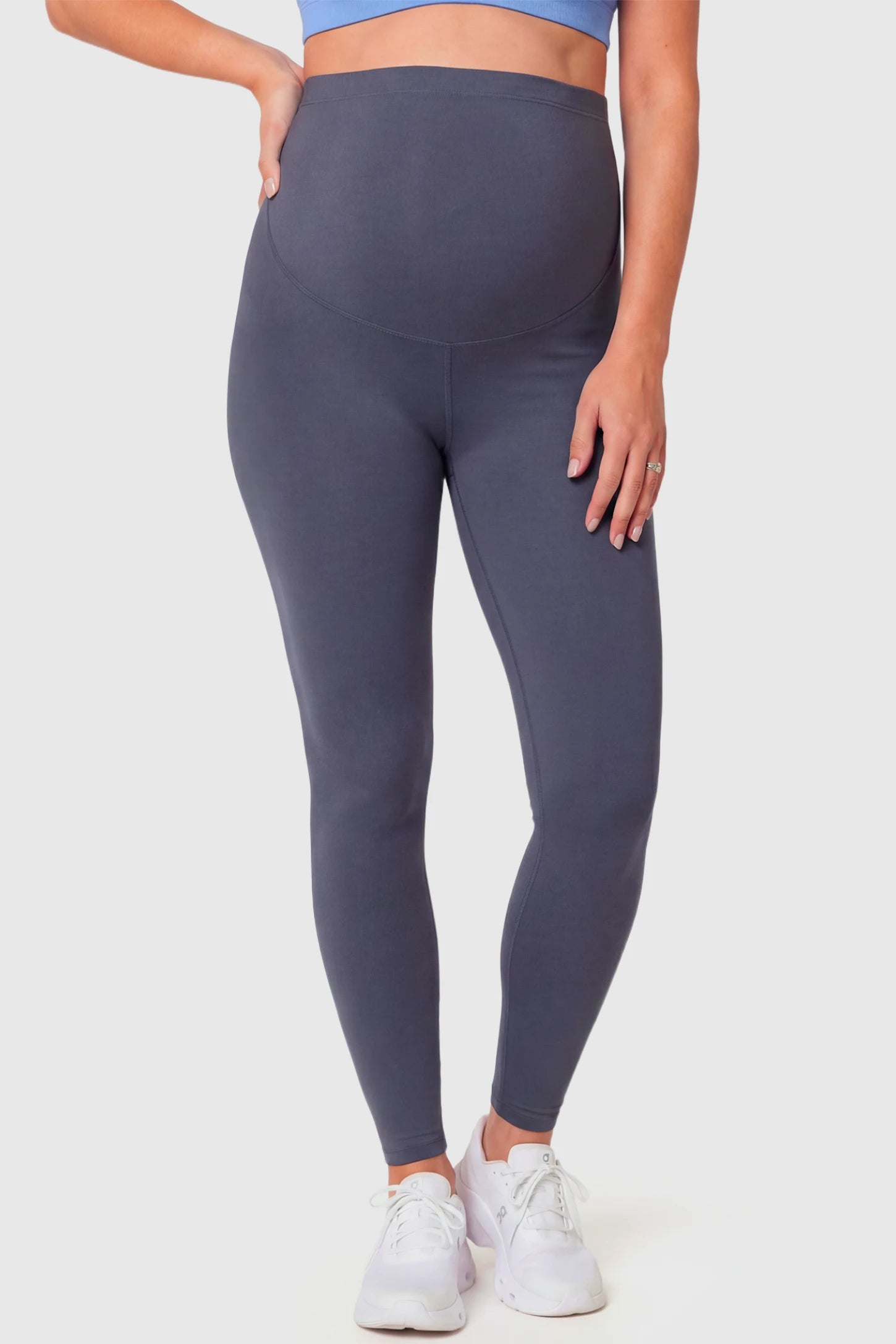 Full-Panel Ankle-Length Maternity Yoga Leggings Full-Panel Ankle-Length Maternity Yoga Leggings in dark gray featuring over-the-belly support and full-length fit on pregnant model.