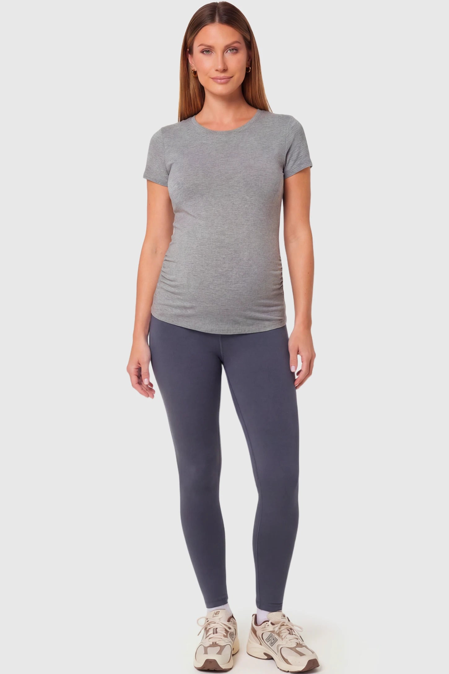 Full-Panel Ankle-Length Maternity Yoga Leggings Full-Panel Ankle-Length Maternity Yoga Leggings in dark gray featuring over-the-belly support and full-length fit on pregnant model.