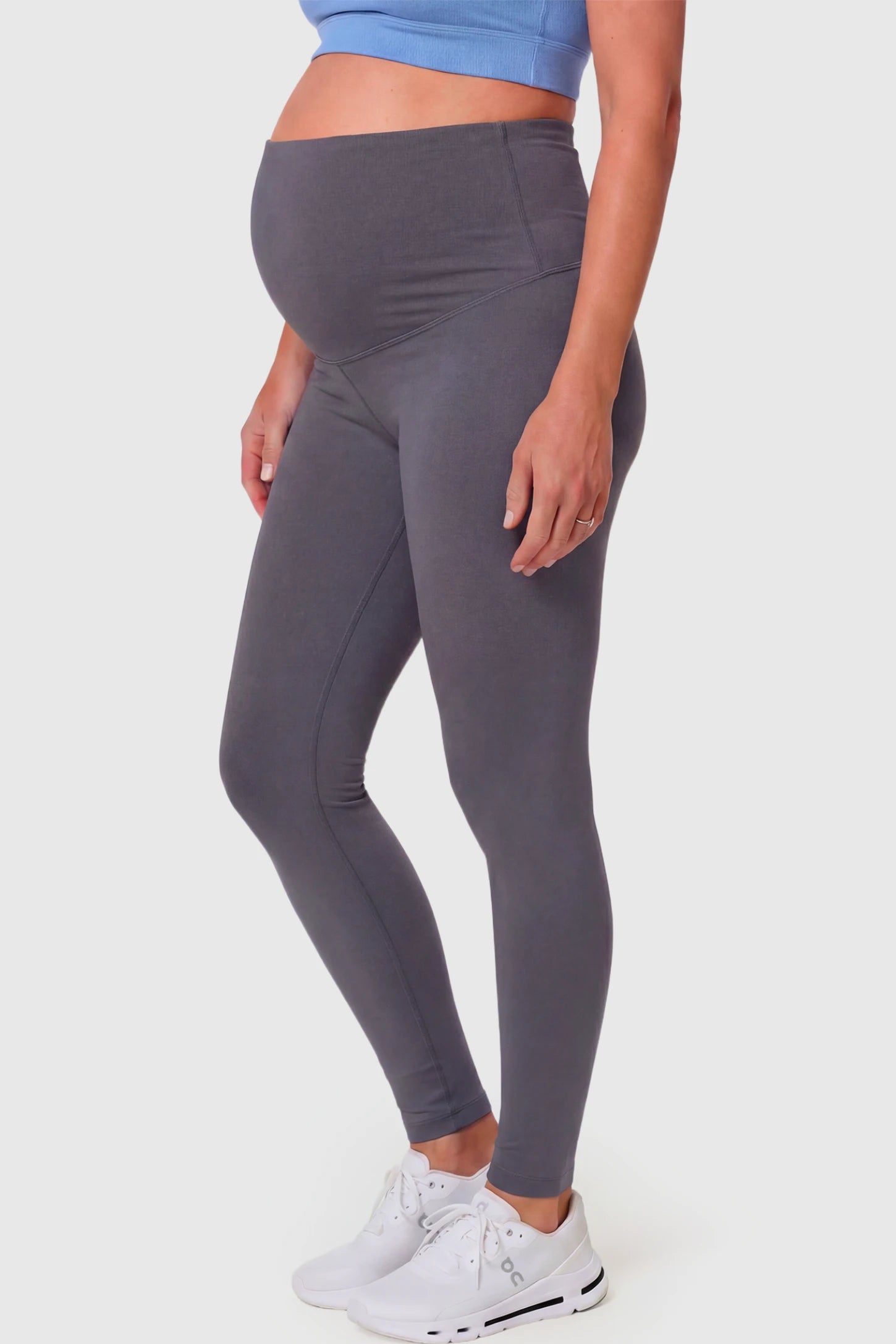 Full-Panel Ankle-Length Maternity Yoga Leggings Full-Panel Ankle-Length Maternity Yoga Leggings in dark gray featuring over-the-belly support and full-length fit on pregnant model.