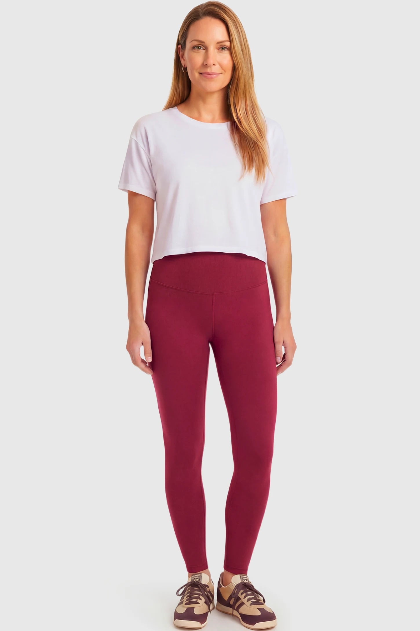 Full-Panel Ankle-Length Maternity Yoga Leggings Full-Panel Ankle-Length Maternity Yoga Leggings in brick red featuring over-the-belly support and full-length fit on non pregnant model.