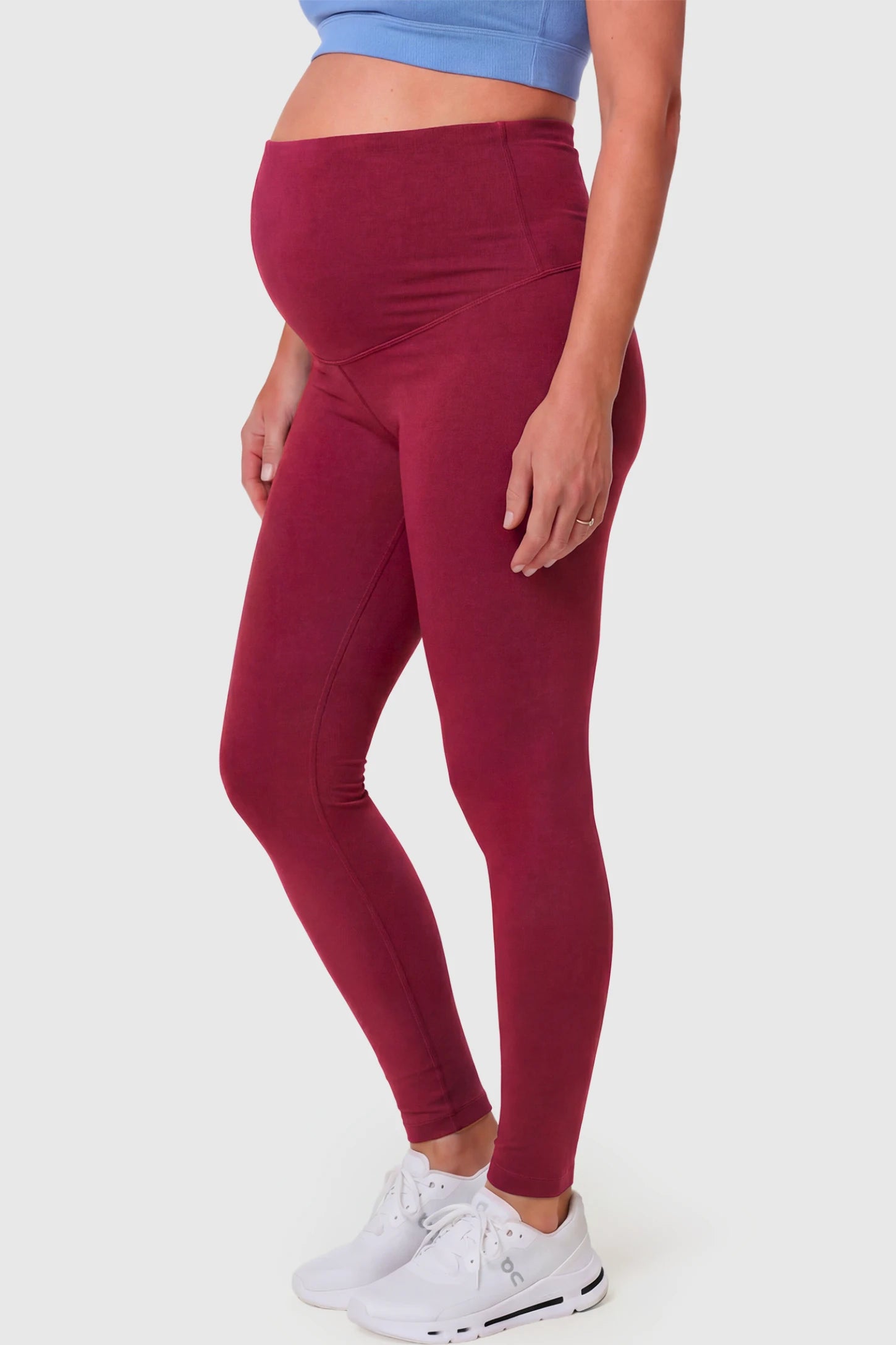 Full-Panel Ankle-Length Maternity Yoga Leggings Full-Panel Ankle-Length Maternity Yoga Leggings in brick red featuring over-the-belly support and full-length fit on pregnant model.