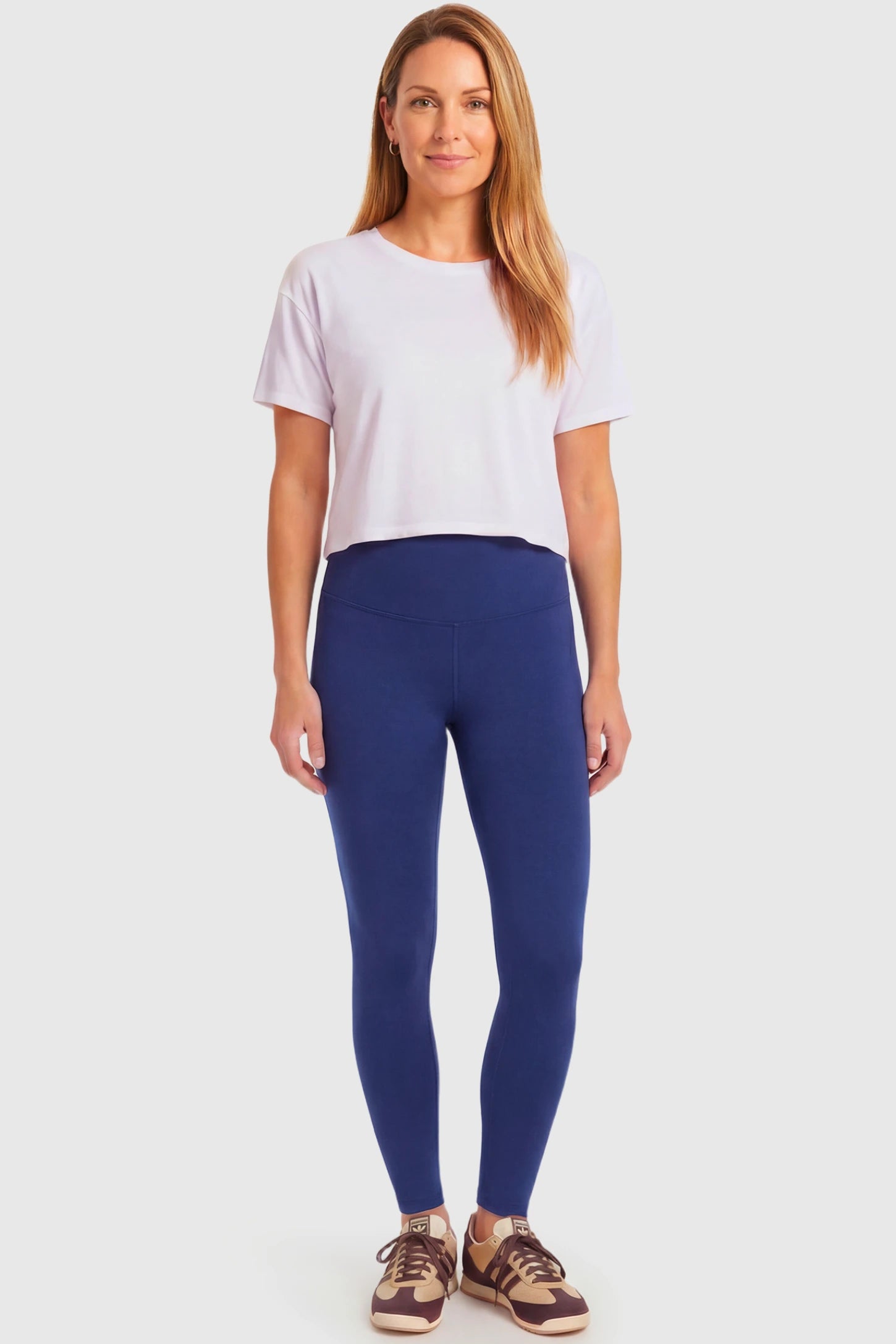 Full-Panel Ankle-Length Maternity Yoga Leggings Full-Panel Ankle-Length Maternity Yoga Leggings in navy blue featuring over-the-belly support and full-length fit on non pregnant model.