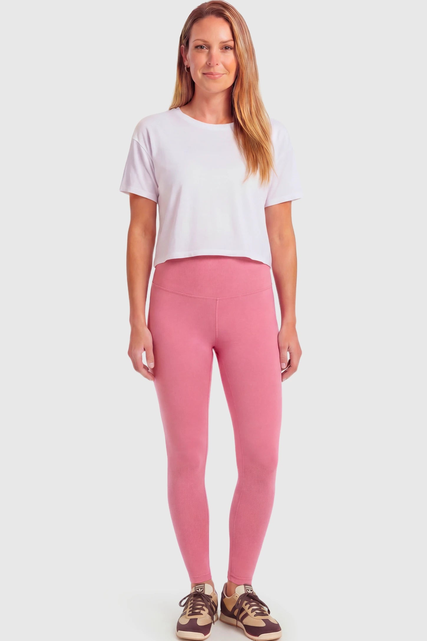 Full-Panel Ankle-Length Maternity Yoga Leggings Full-Panel Ankle-Length Maternity Yoga Leggings in rouge pink featuring over-the-belly support and full-length fit on non pregnant model.
