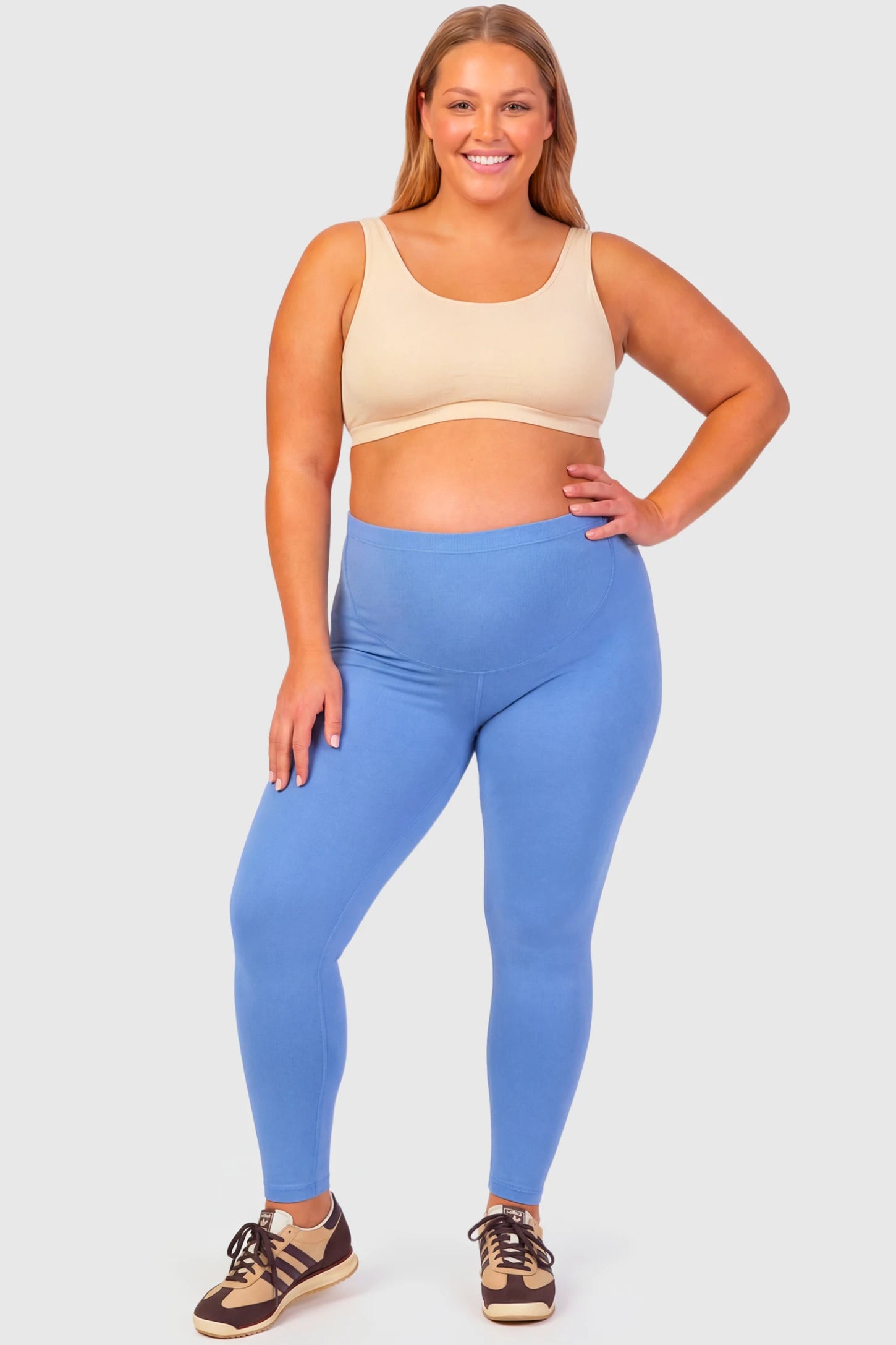 Full-Panel Ankle-Length Maternity Yoga Leggings Full-Panel Ankle-Length Maternity Yoga Leggings in sky blue featuring over-the-belly support and full-length fit on plus size pregnant model.
