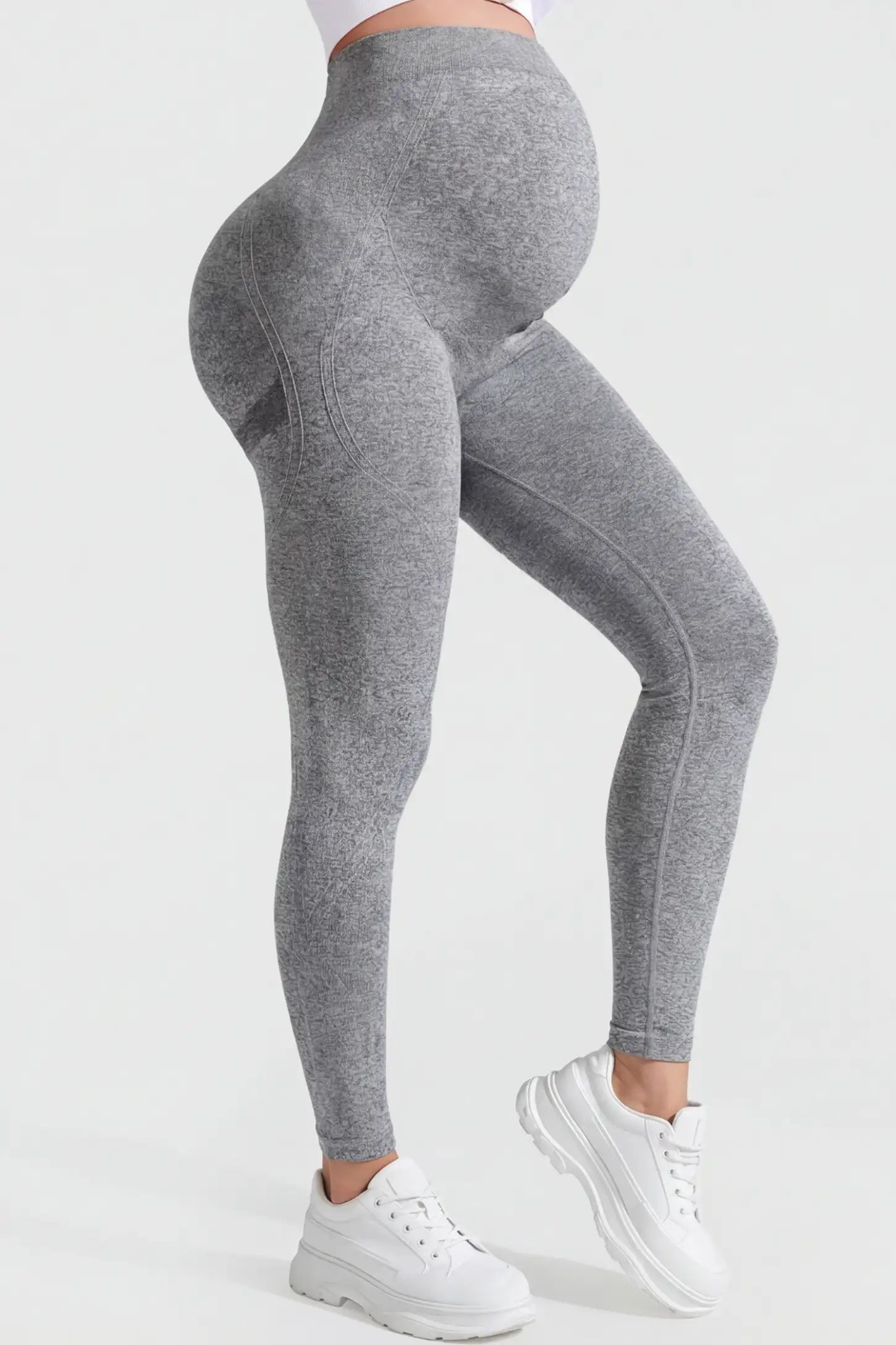 Full-Panel Full-Length Maternity Yoga Leggings Full-Panel Full-Length Maternity Yoga Leggings in gray featuring high-waist bump support and ankle-length bodycon fit on pregnant model.