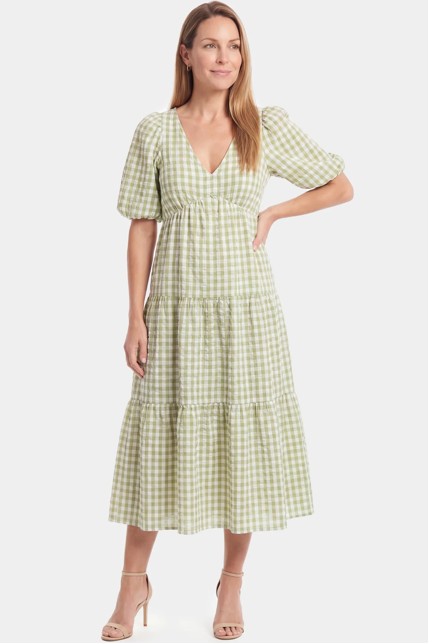 Gingham V-Neck Tiered Maxi Maternity Dress Gingham V-Neck Tiered Maxi Maternity Dress in Green featuring a flowing tiered silhouette in full body front view on a postpartum model