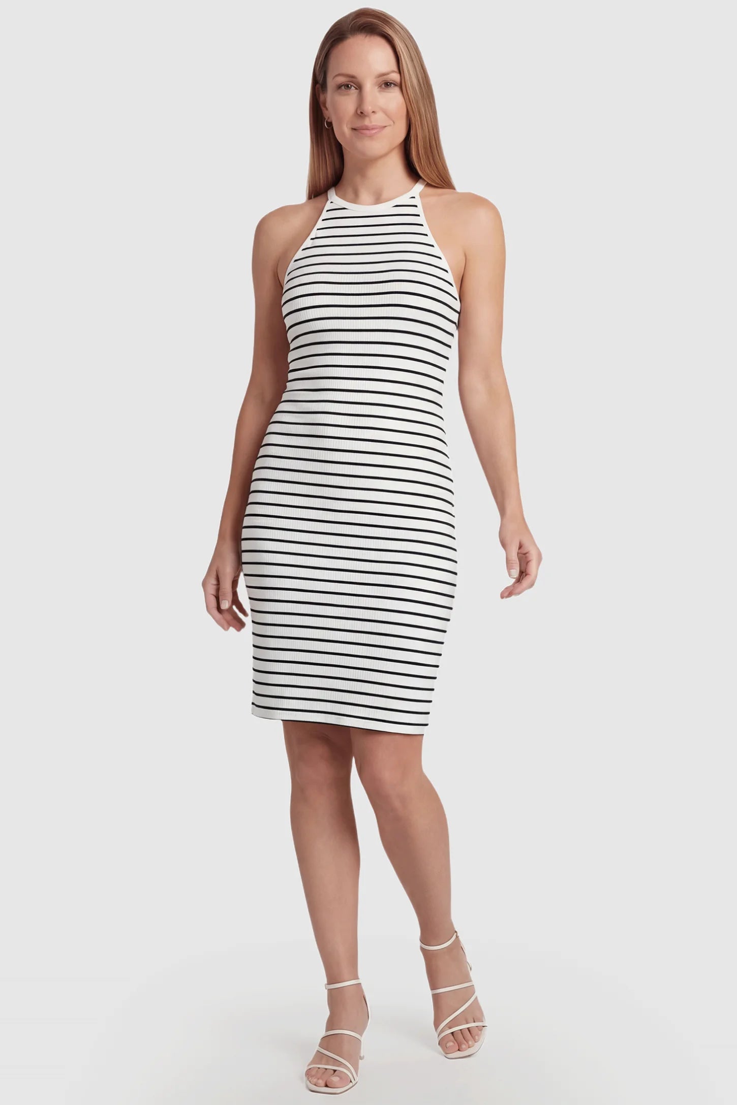 Striped Halter Neck Bodycon Maternity Short Dress Striped Halter Neck Bodycon Maternity Short Dress in black and white featuring sleeveless halter neckline on a non pregnant model, front view.