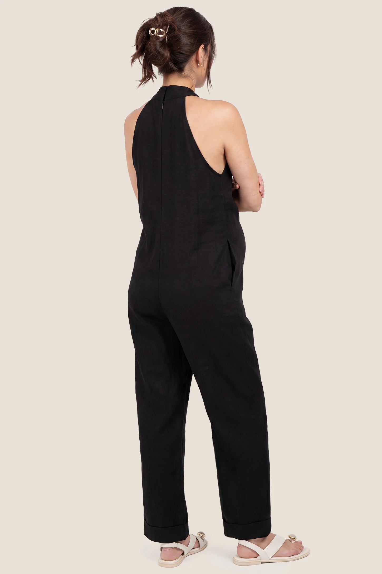 Halter Neck Wide-Leg Maternity Jumpsuit Halter neck wide-leg maternity jumpsuit in black with breathable cotton fabric, back view on pregnant model

