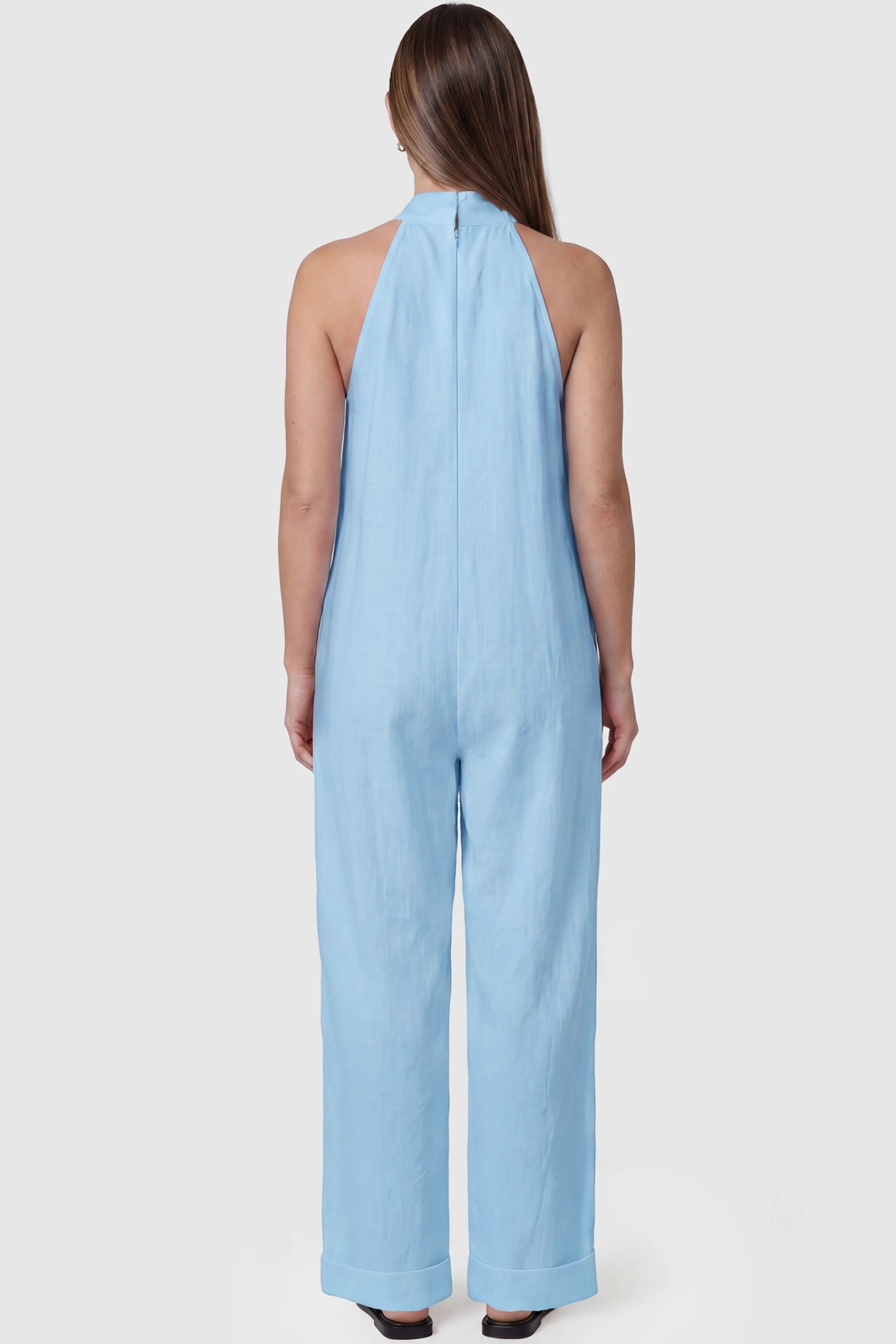 Halter Neck Wide-Leg Maternity Jumpsuit Halter neck wide-leg maternity jumpsuit in blue with breathable cotton fabric, back view on pregnant model