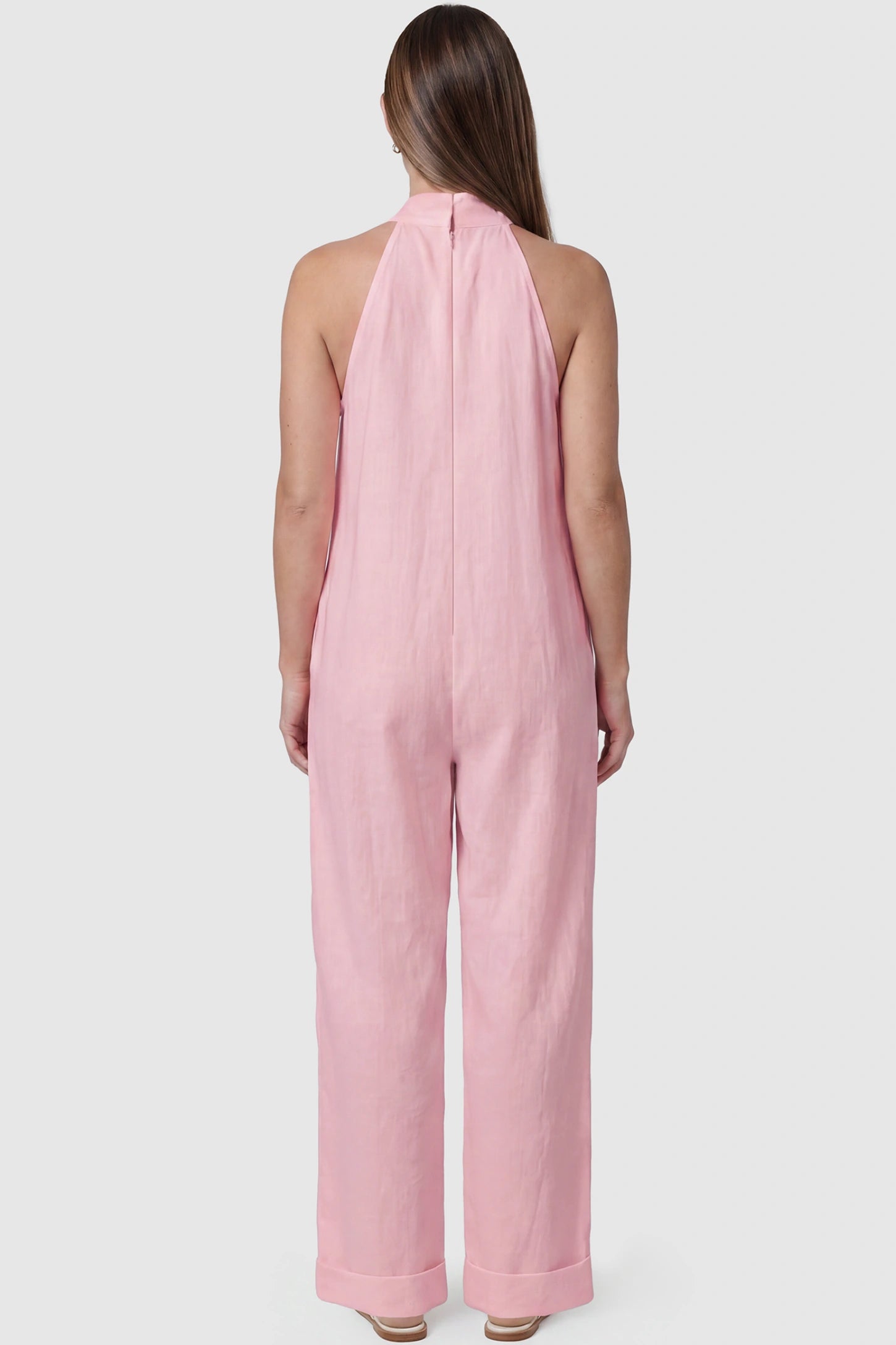 Halter Neck Wide-Leg Maternity Jumpsuit Halter neck wide-leg maternity jumpsuit in pink with breathable cotton fabric, back view on pregnant model