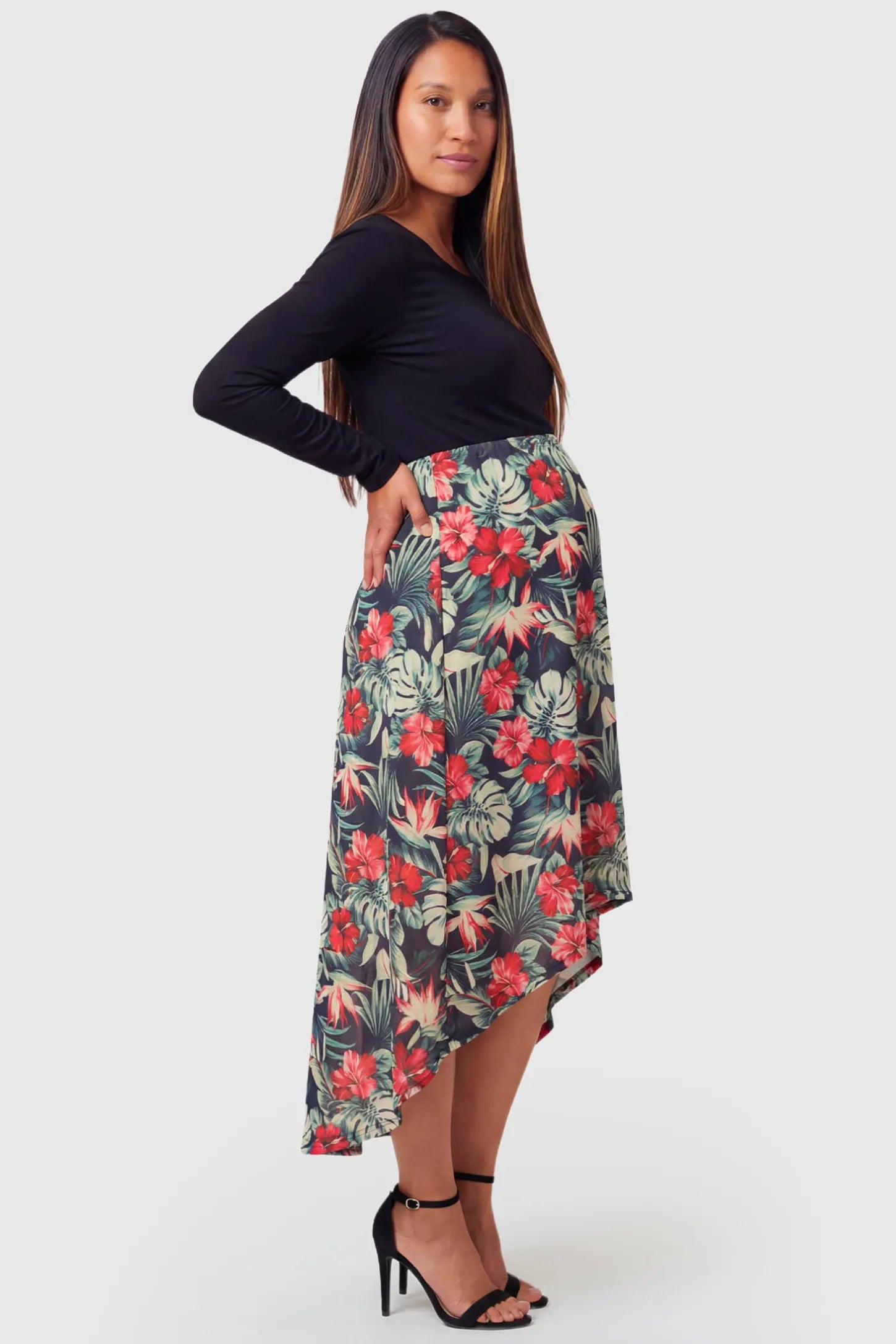 Hi-Low Long Sleeve Maternity & Nursing Midi Dress Hi-Low Long Sleeve Maternity & Nursing Midi Dress in black and floral featuring empire waist and long sleeves on pregnant model.