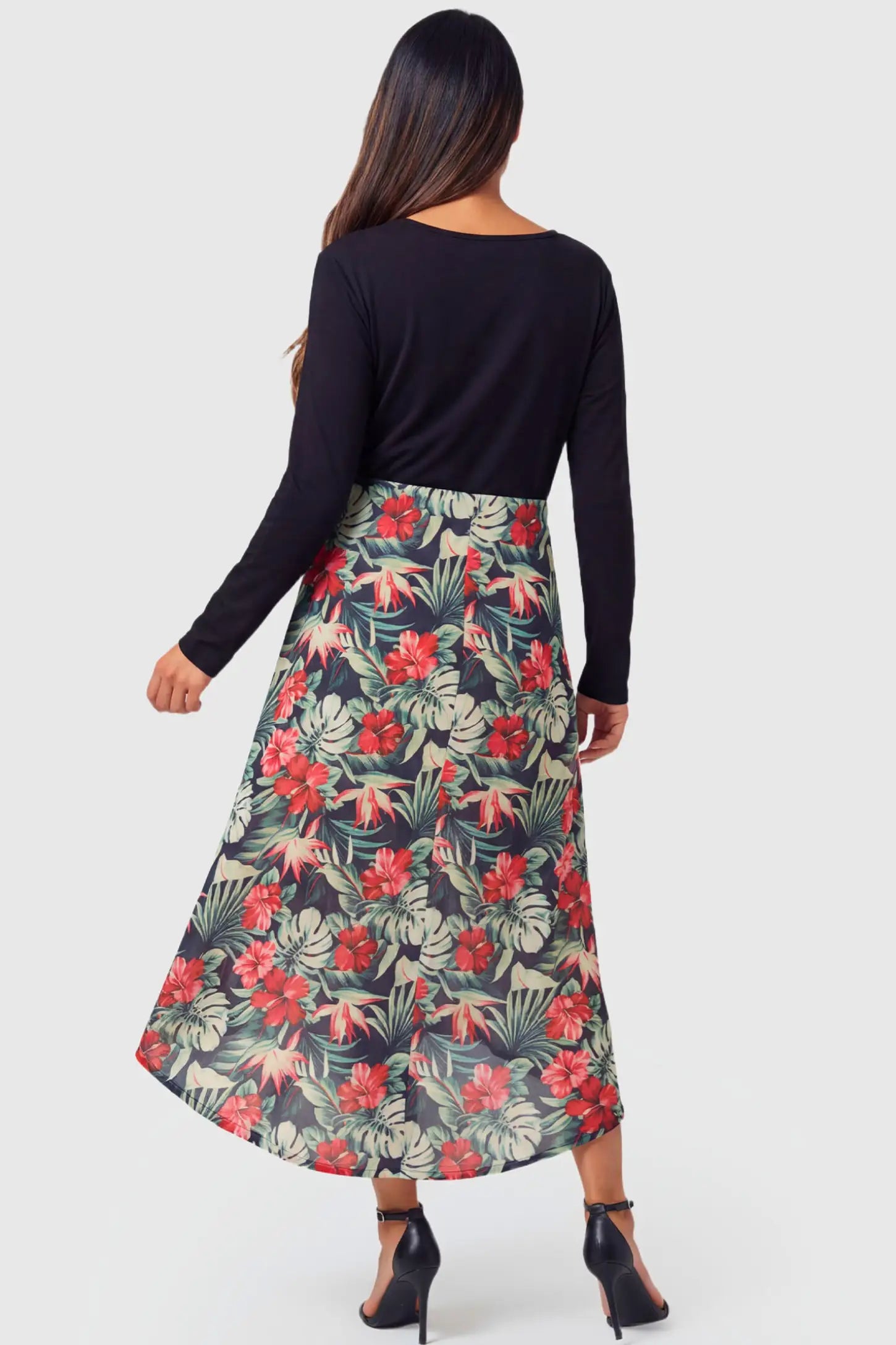 Hi-Low Long Sleeve Maternity & Nursing Midi Dress Hi-Low Long Sleeve Maternity & Nursing Midi Dress in black and floral featuring empire waist and long sleeves on pregnant model.