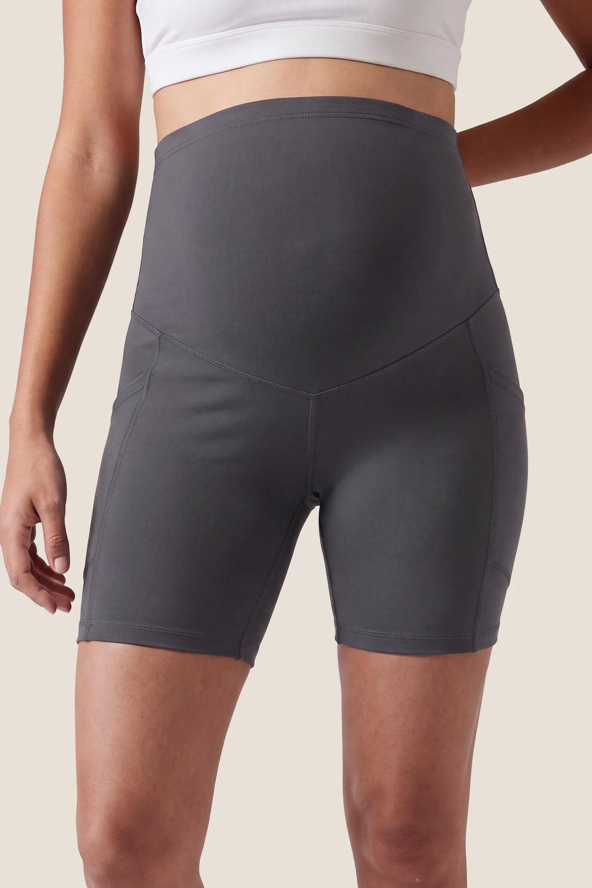 High-Rise Stretch Biker Maternity Shorts High-Rise-Stretch-Biker-Maternity-Shorts in Dark Gray featuring full belly support, seam-contoured fit, high-waisted maternity waistband, and stretchy performance fabric, front view.