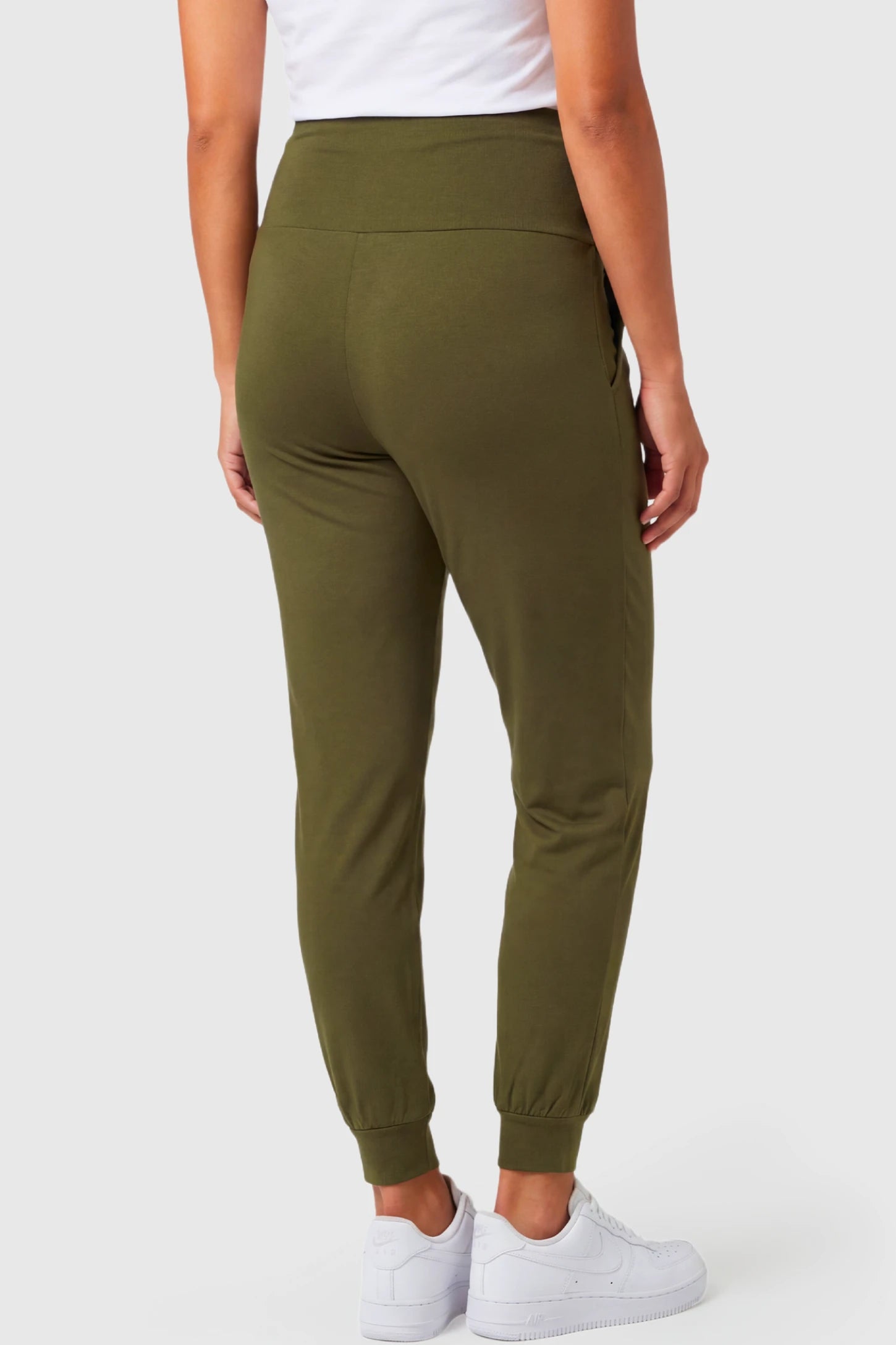 Full-Panel Cuffed Maternity Joggers Full-Panel Cuffed Maternity Joggers in army green featuring high-rise over-the-belly panel, and ribbed cuff hem on pregnant model.