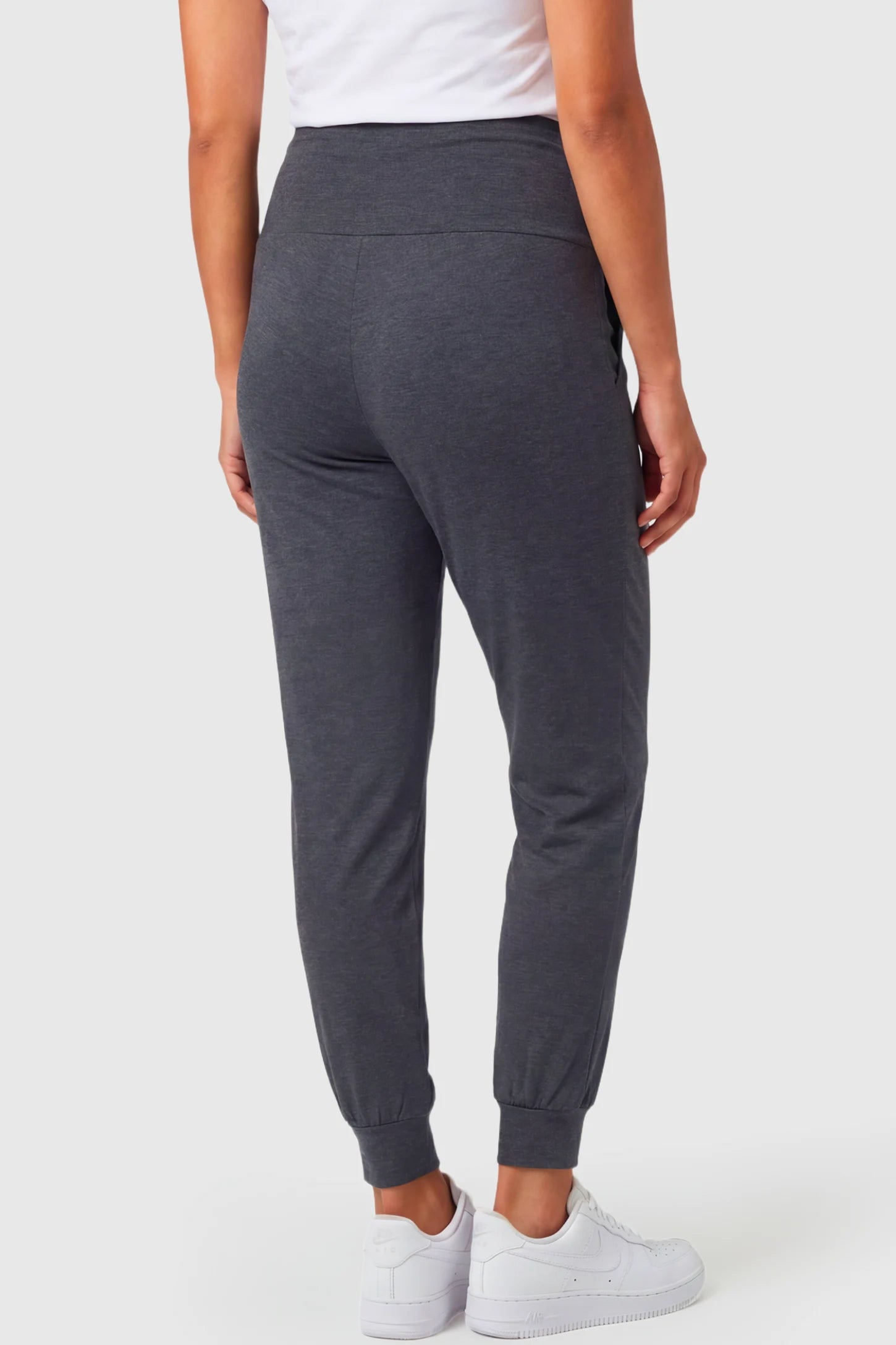 Full-Panel Cuffed Maternity Joggers Full-Panel Cuffed Maternity Joggers in dark gray featuring high-rise over-the-belly panel, and ribbed cuff hem on pregnant model.