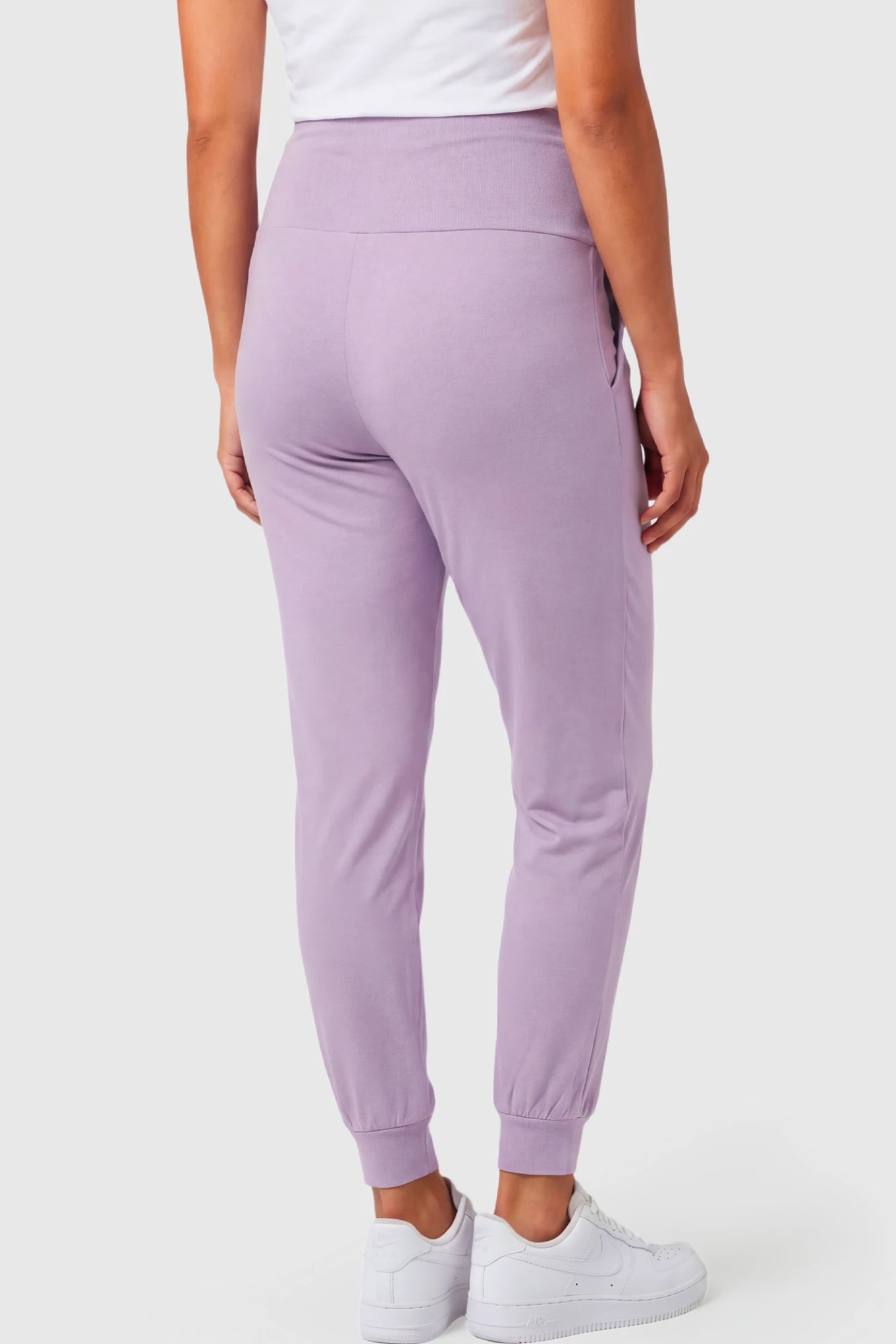 Full-Panel Cuffed Maternity Joggers Full-Panel Cuffed Maternity Joggers in lavender featuring high-rise over-the-belly panel, and ribbed cuff hem on pregnant model.