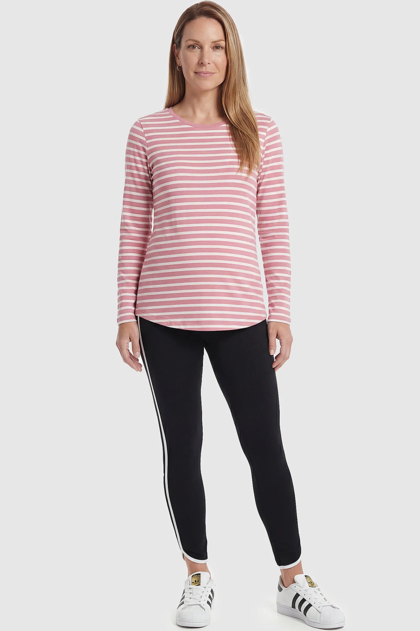 Shaping Side-Stripe Maternity Leggings High Waisted Side Stripe Maternity Leggings in black featuring high-stretch recovery fabric on a postpartum model front view.