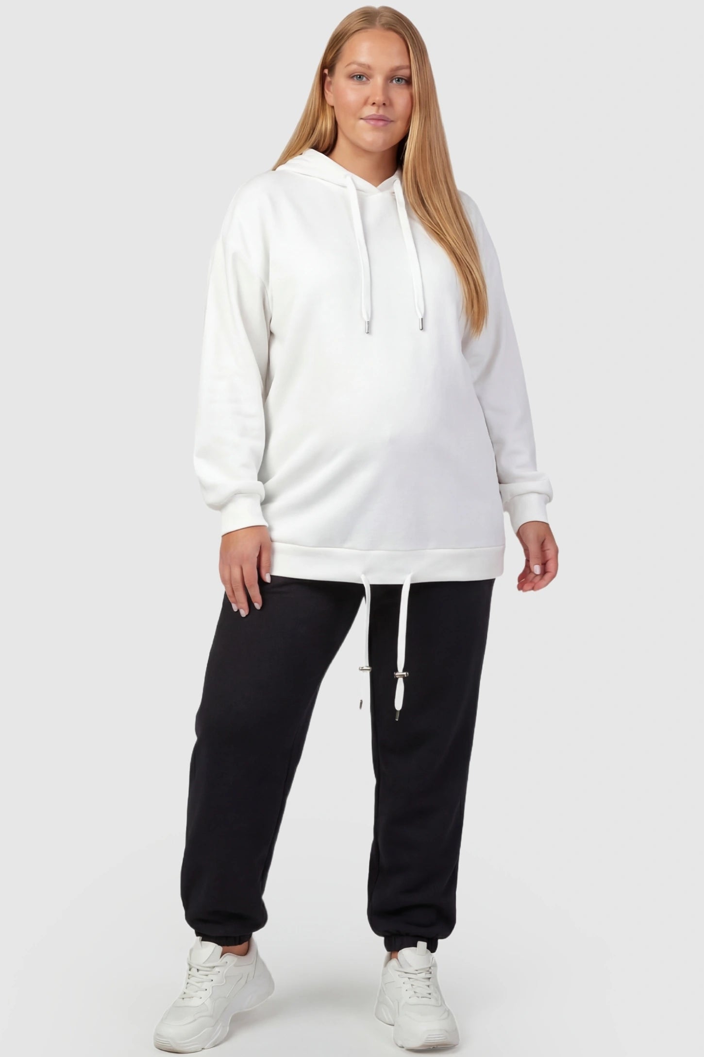 High-Rise Drawstring Waist Loose Fit Jogger Maternity Pants High-rise drawstring waist loose fit jogger maternity pants in black with relaxed fit & adjustable drawstring, full body on plus-size model