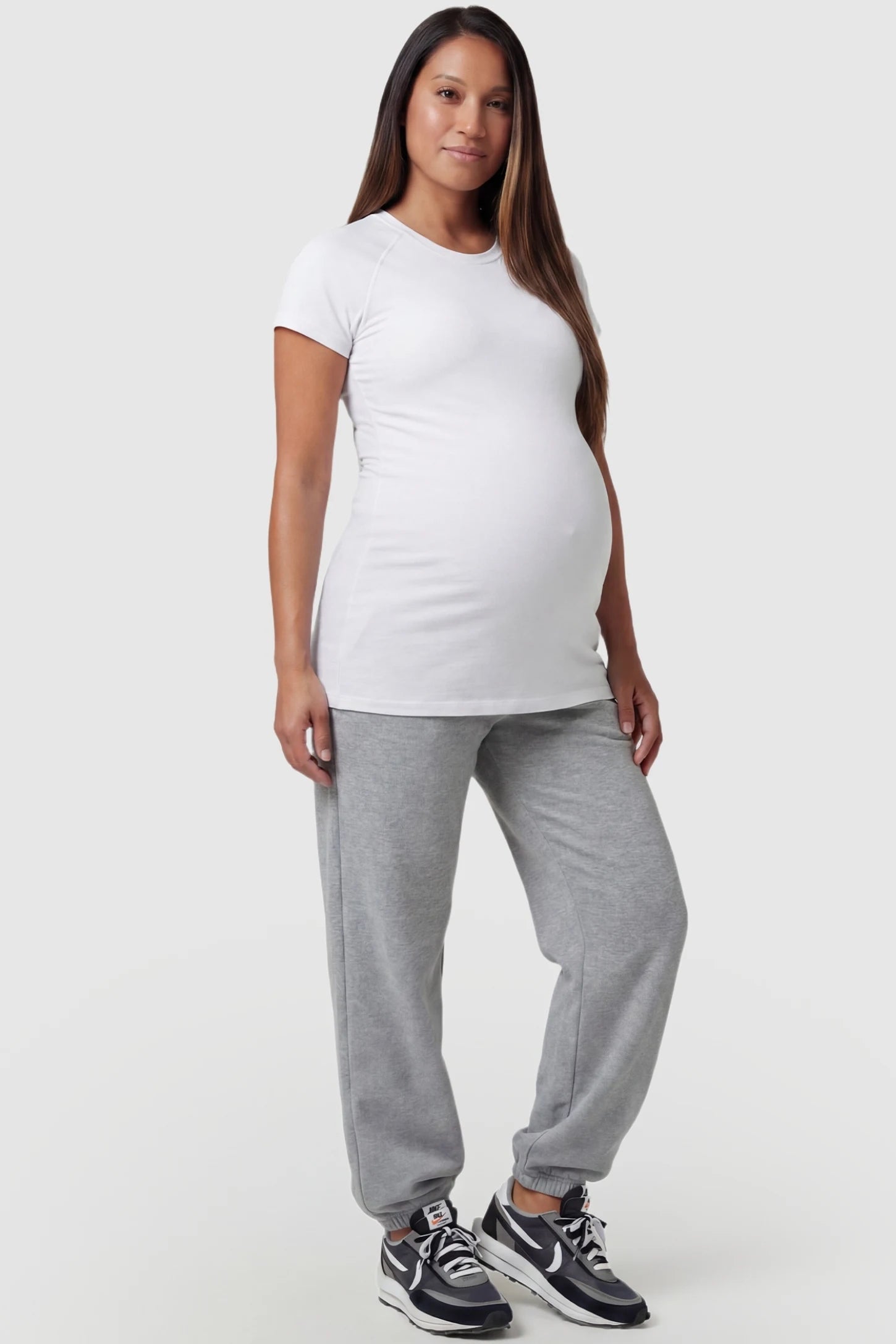 High-Rise Drawstring Waist Loose Fit Jogger Maternity Pants High-rise drawstring waist loose fit jogger maternity pants in gray with relaxed fit, full body on pregnant model