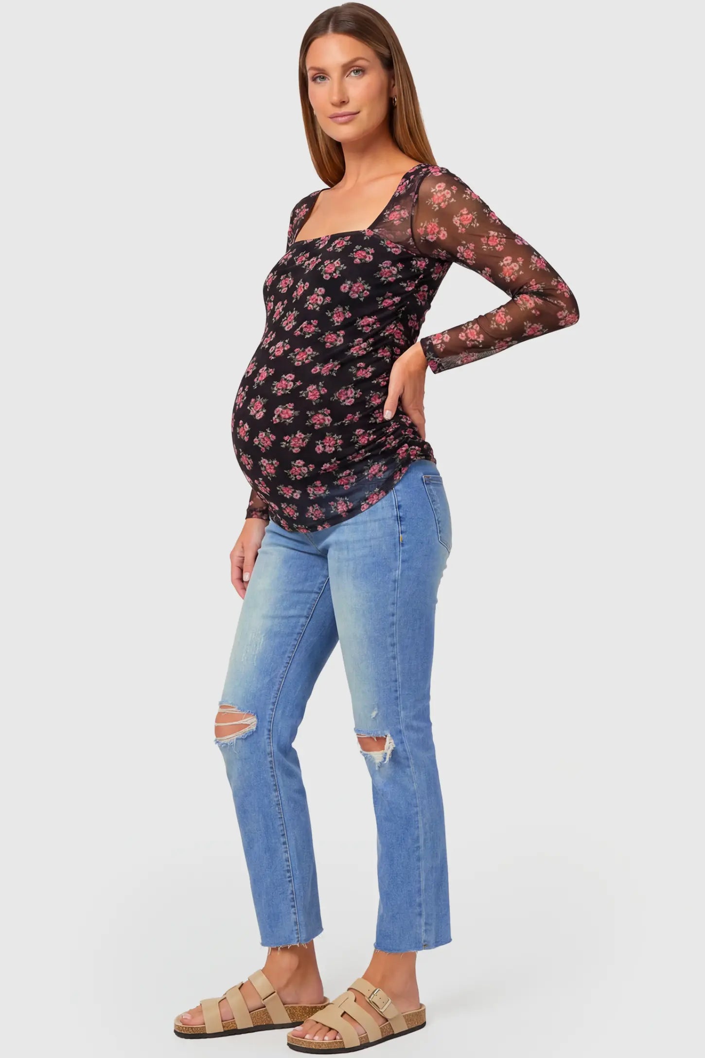 Raw Hem Ankle Straight Leg Maternity Jeans Raw Hem Ankle Straight Leg Maternity Jeans in blue denim featuring high-rise over-the-belly panel and knee-open distressing on pregnant model.