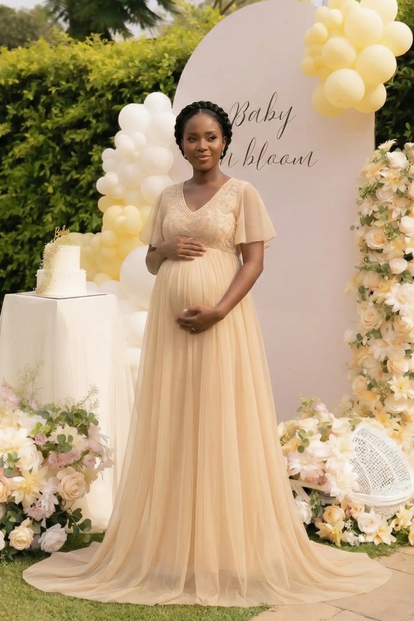 Lace Embroidered Short Flutter Sleeve Maxi Maternity Gown Lace embroidered short flutter sleeve maxi maternity gown in apricot with embroidered lace and long-train, full body on a UGC model