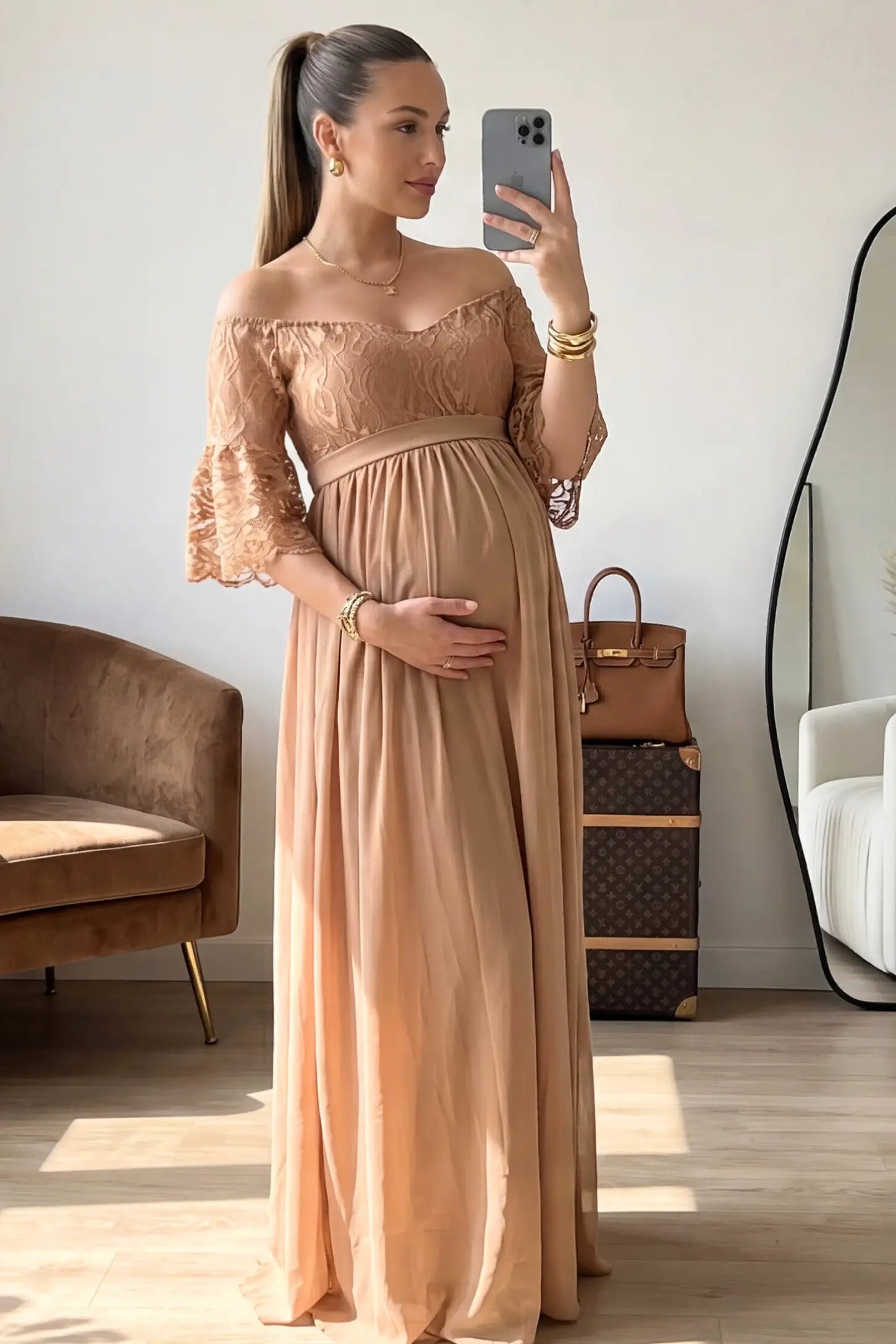 Lace-Spliced Off-Shoulder Flutter Sleeve Maxi Maternity Dress Lace-spliced off-shoulder flutter sleeve maxi maternity dress in Coffee featuring flowing silhouette in full body view on a UGC model