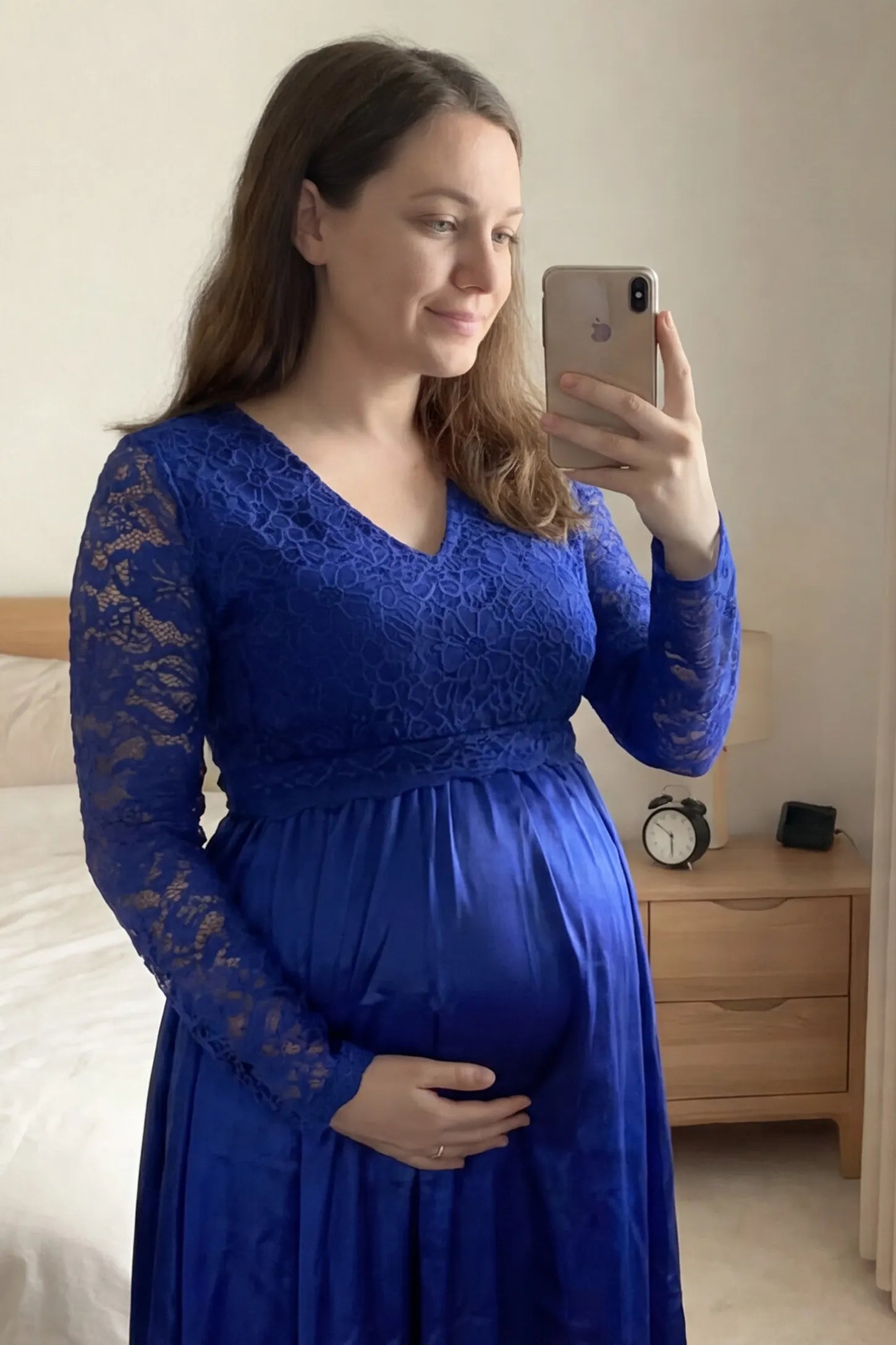 Lace-Spliced Silk Long Sleeve Maxi Maternity Dress Lace-spliced silk long sleeve maxi maternity dress in blue featuring lace bodice and sleeves in front view on a UGC model