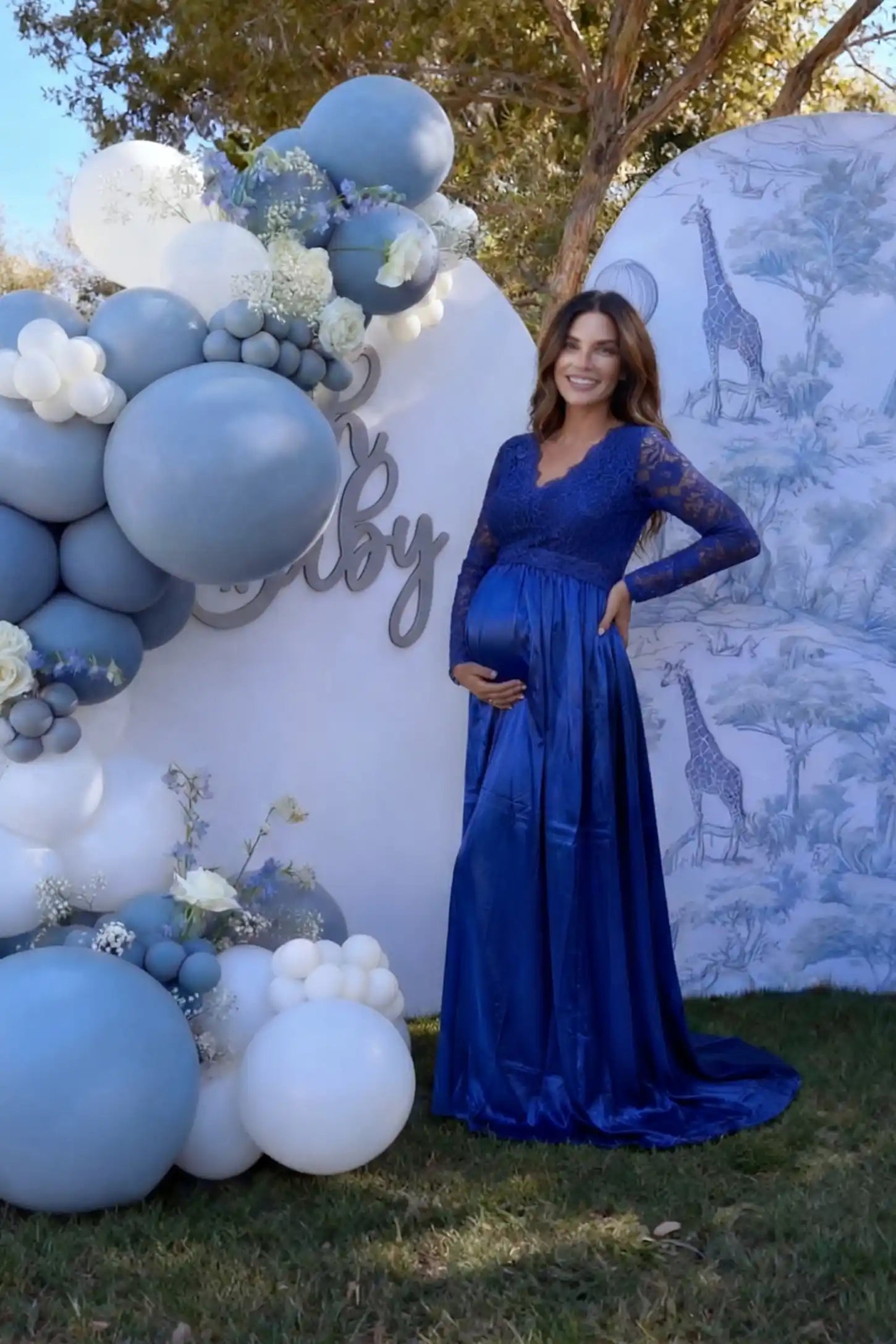 Lace-Spliced Silk Long Sleeve Maxi Maternity Dress Lace-spliced silk long sleeve maxi maternity dress in blue featuring lace bodice and sleeves in front view on a UGC model